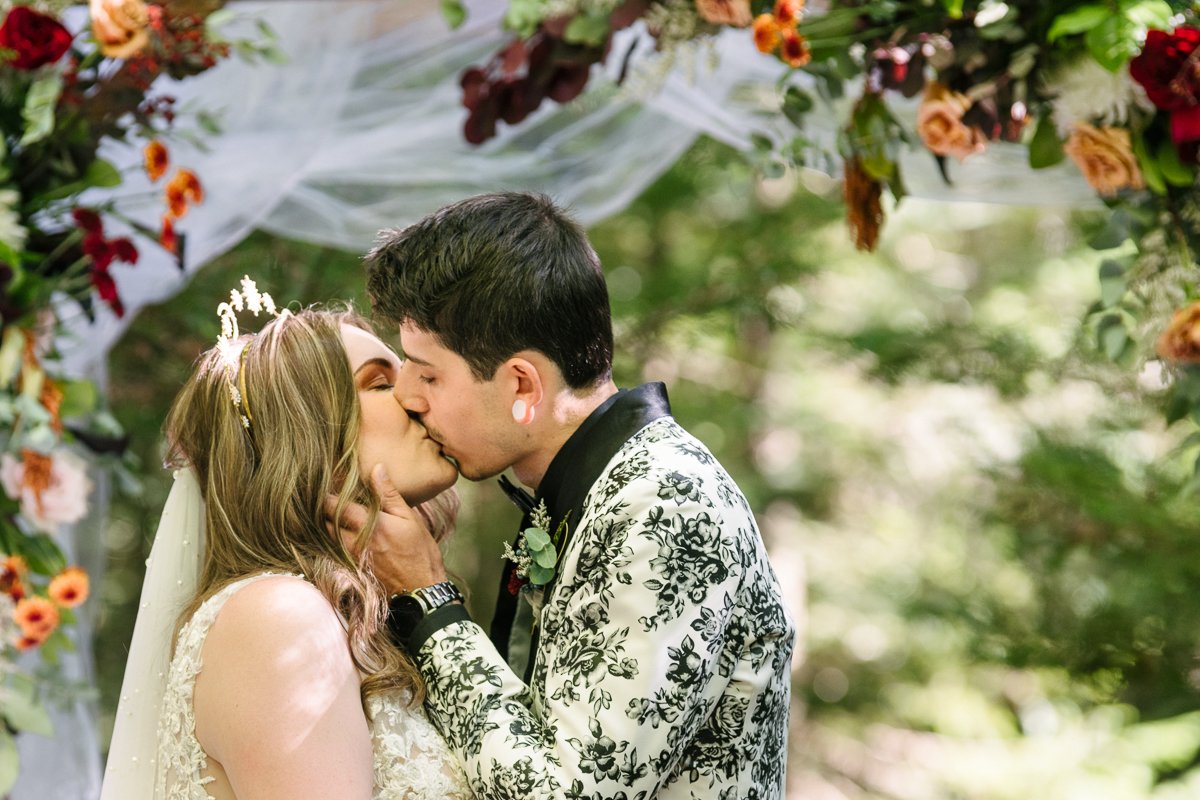 Couple kissing each other on wedding