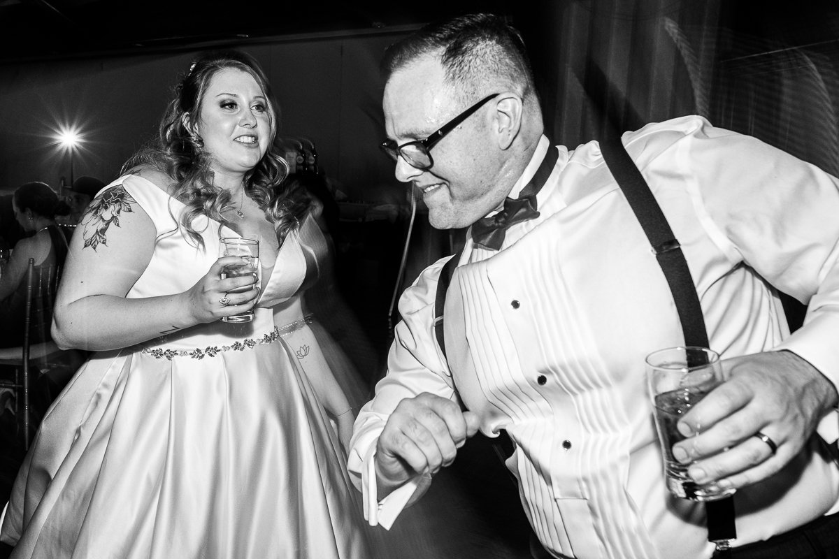 Couple dancing on wedding day black and white image