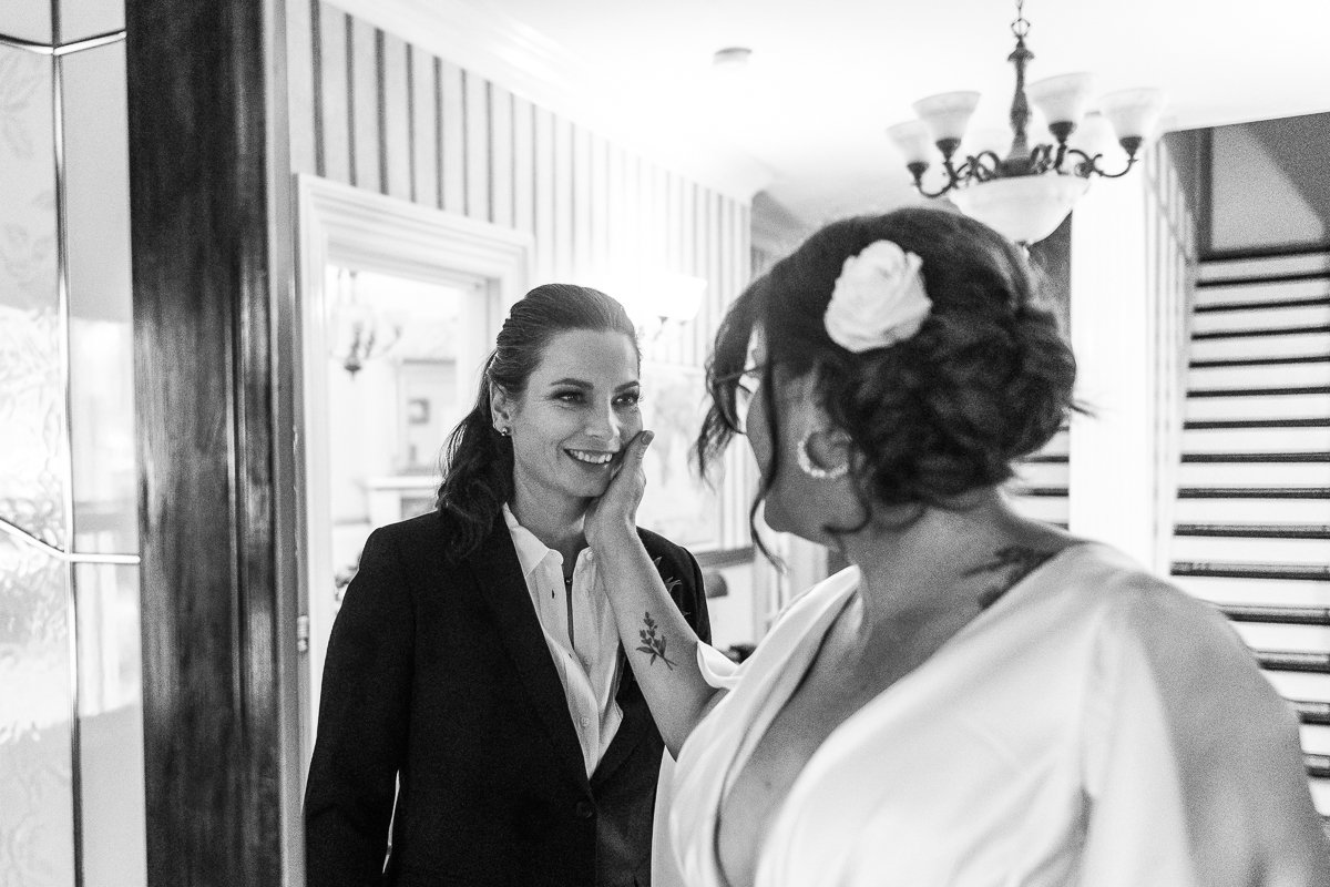 Black and white image of brides on their wedding day - LGBT wedding event