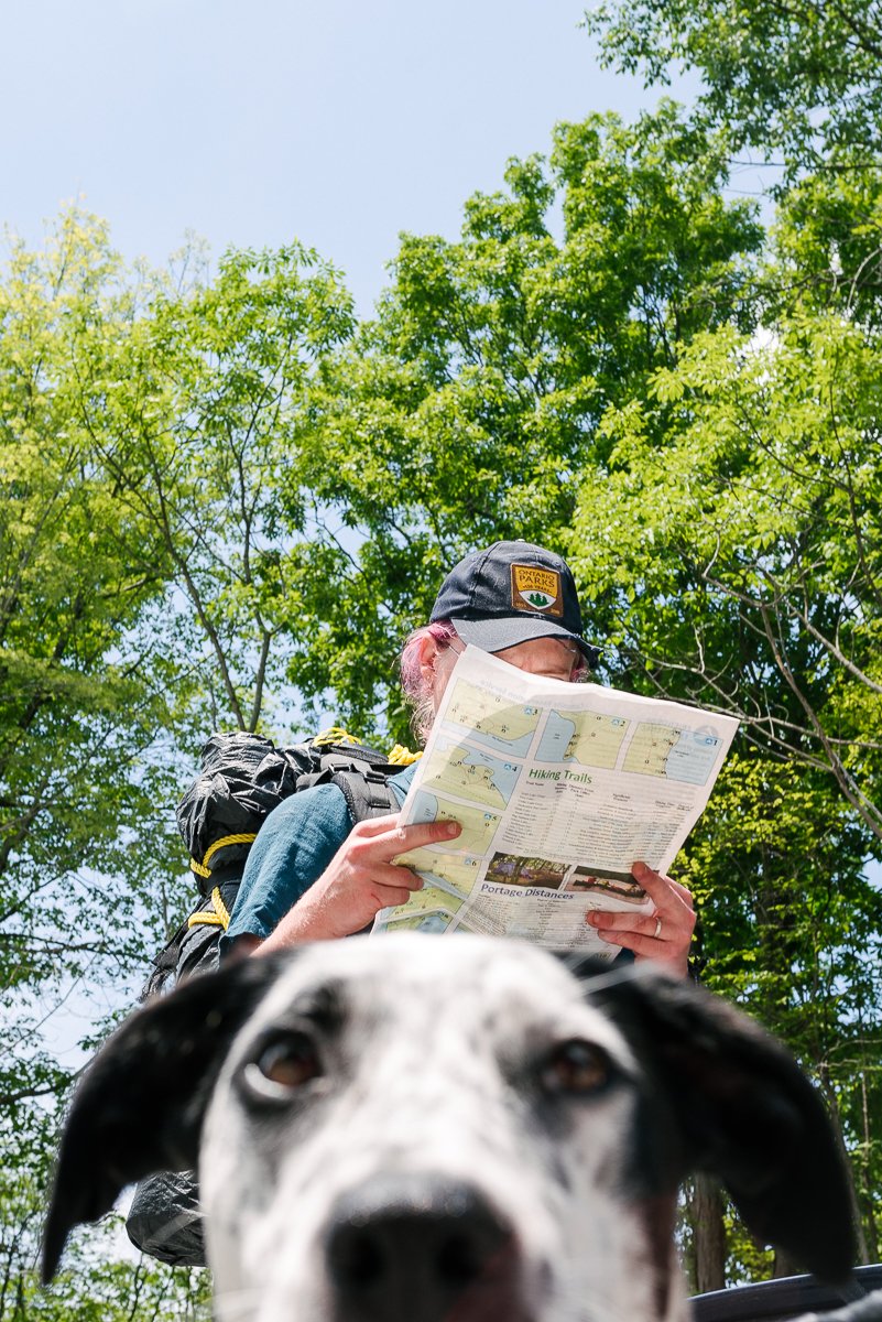 Man reading map in the frontenac park