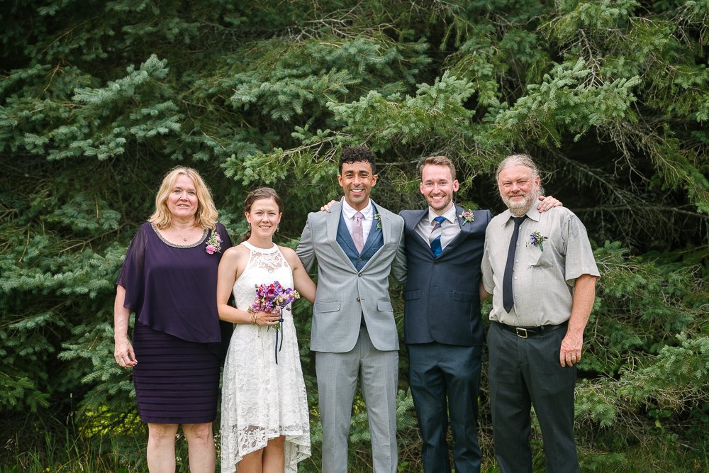 Picture of bride and groom with family and friends. 