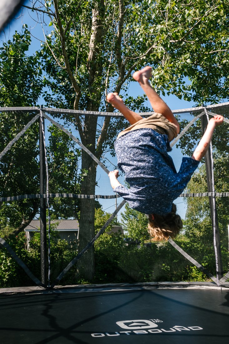 Kids jumping at the trampoline. 
