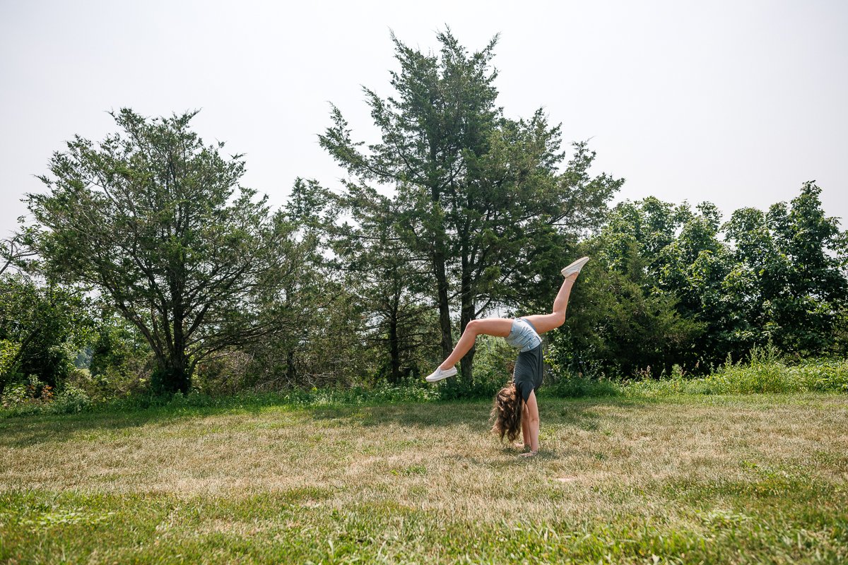 Girl doing acrobats in the ground