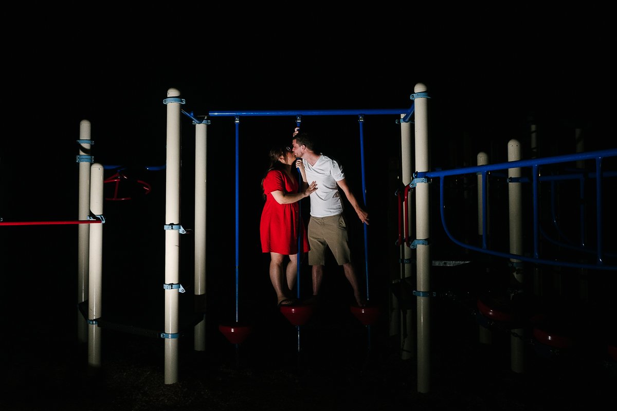 Couple celebrating at night in the park