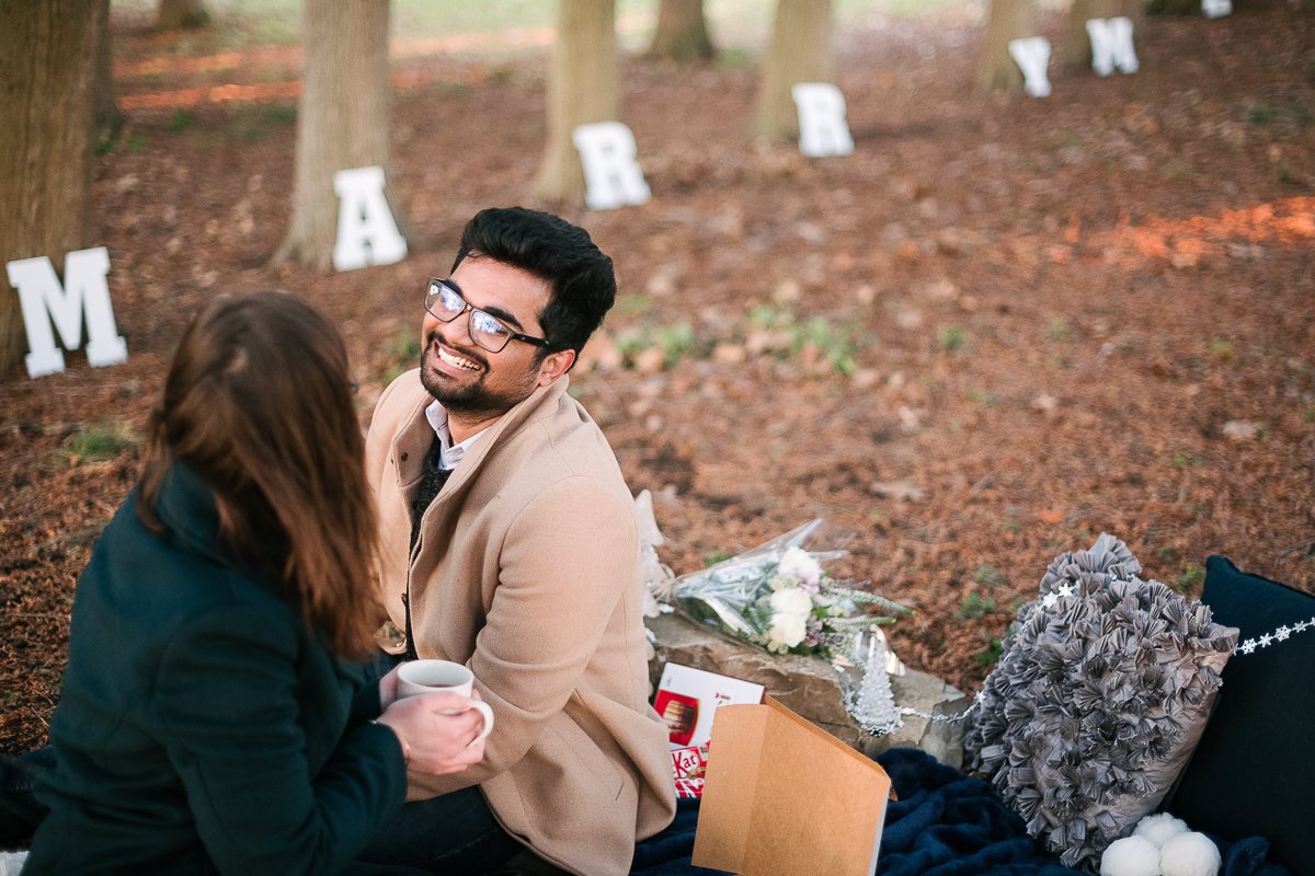 Couple drinking tea coffee together on their proposal. 