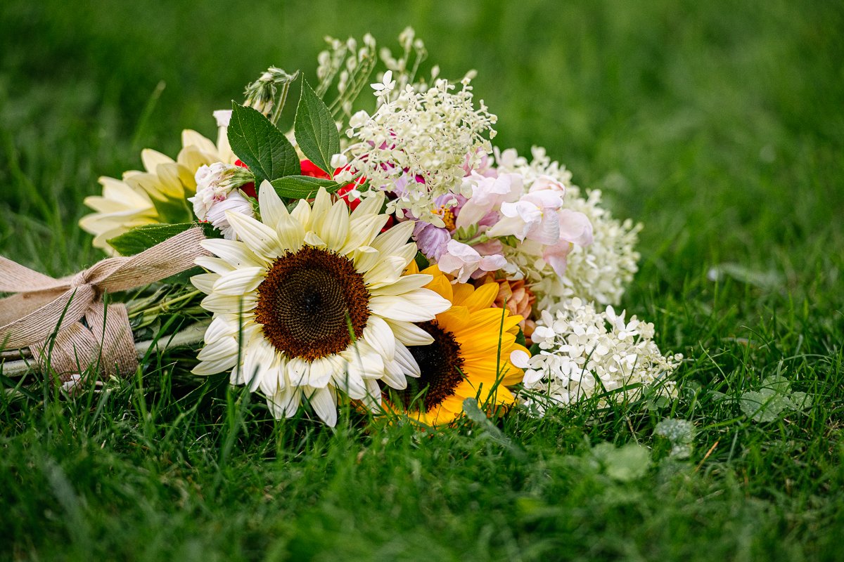Beautiful flower wedding bouquet on the grass