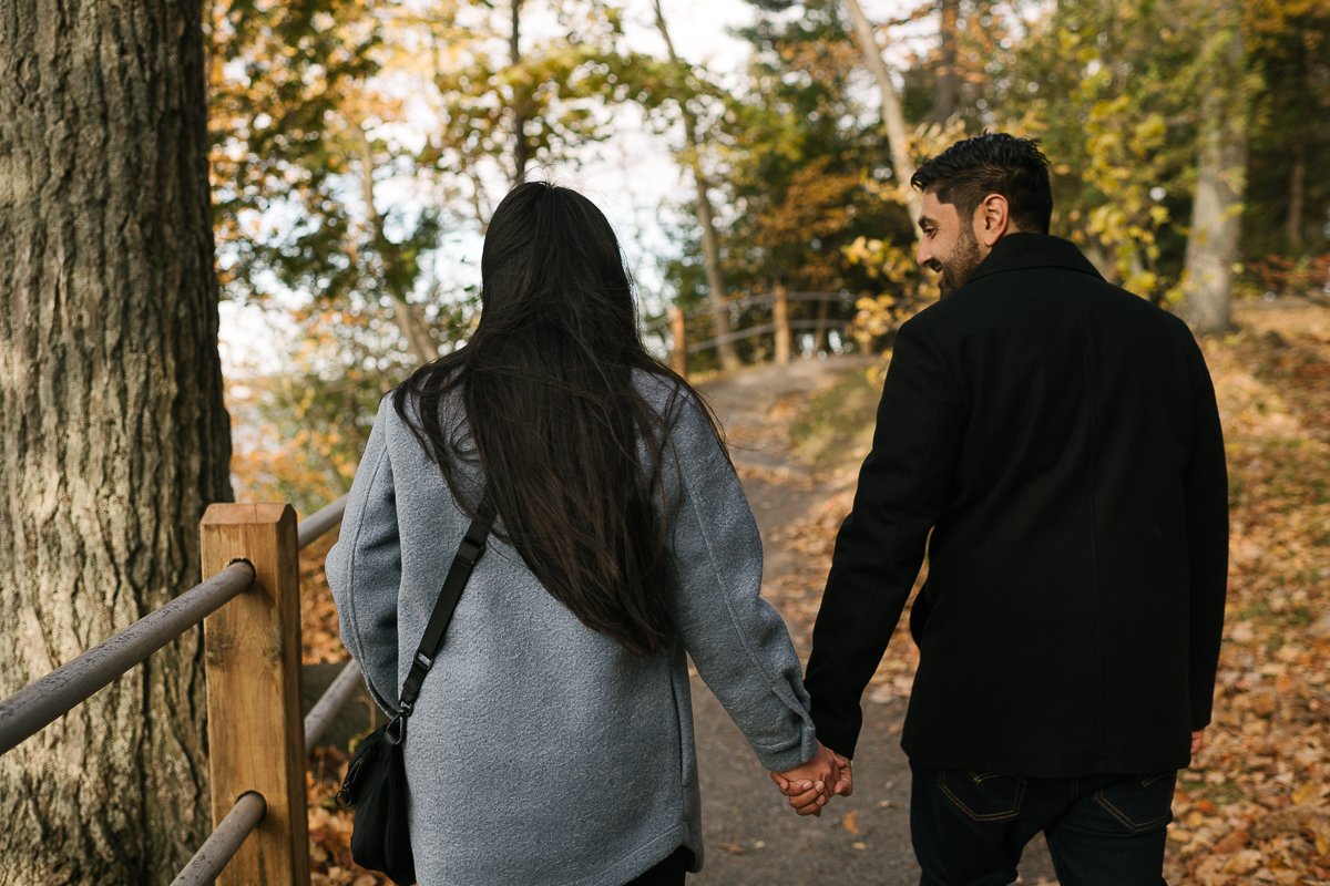 Couple walking hand in hand together 