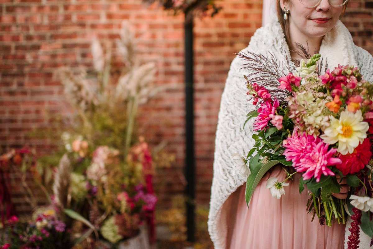 Beautiful bride with bouquet of flowers