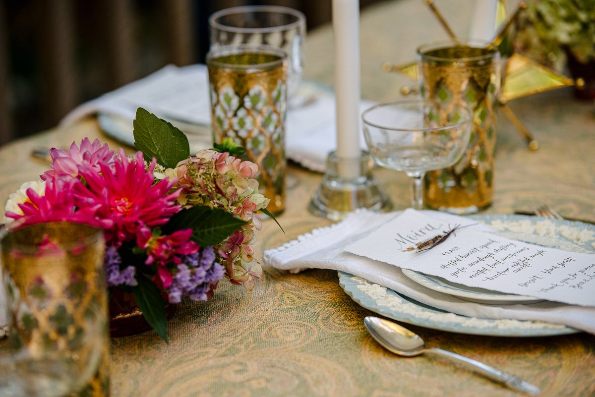 Beautiful table setting with personal invitations.
