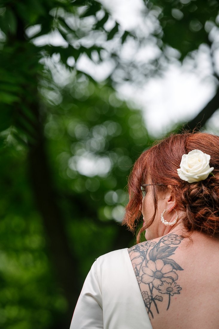 Bride wearing flower in her hairs at her wedding