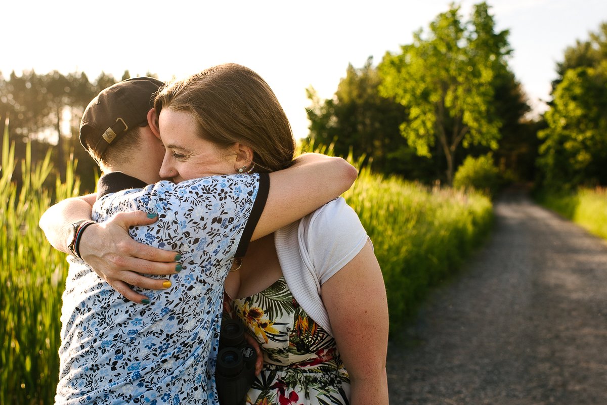 Couple hugging each other with happiness on their engagement.