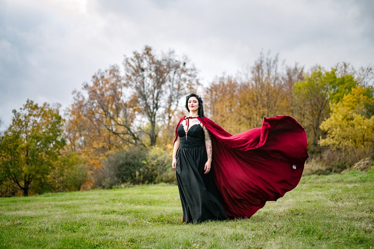 Bride wearing black and red in halloween themed wedding
