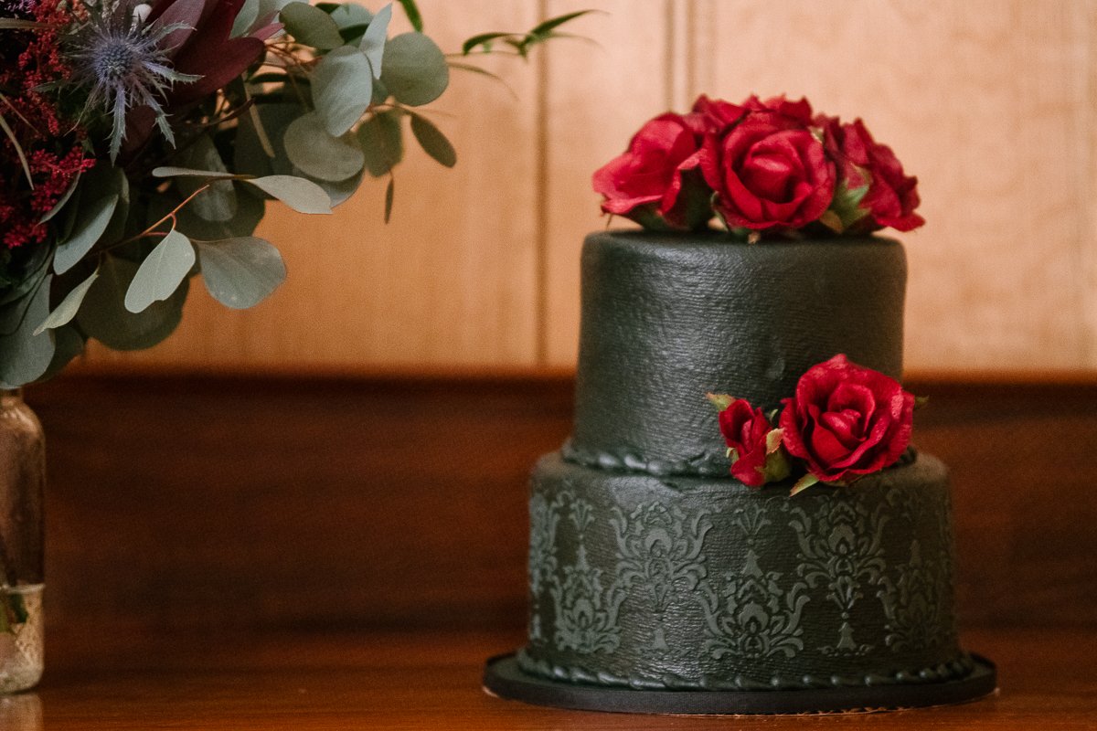 Halloween themed black and red cake in the wedding