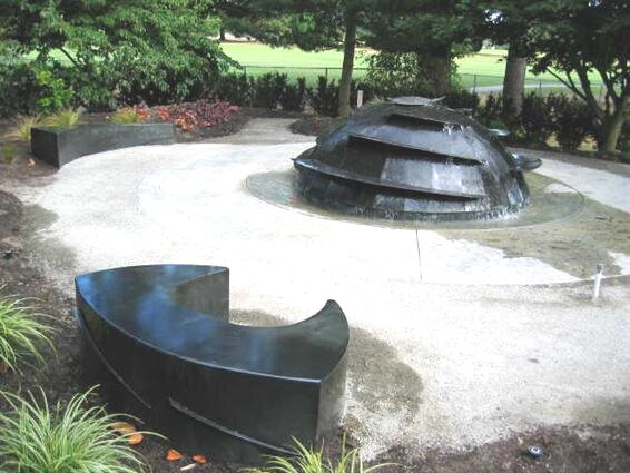  Follow the path to the top of the Viewing Mound and discover the metal water feature 'Fibonacci' by Pam Hom 