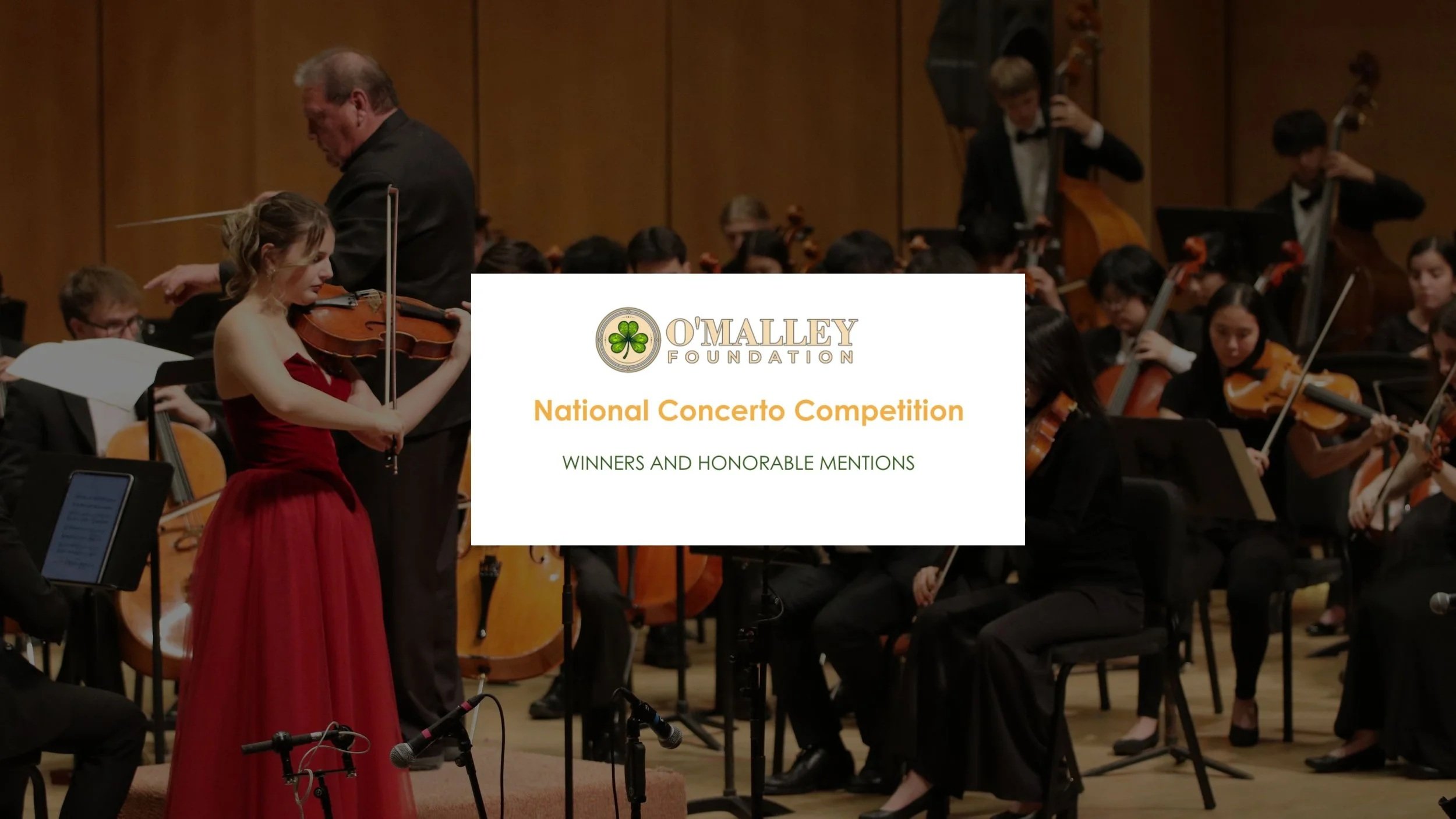 An orchestra in the background and a poster showcasing the winners of a concerto competition have been announced