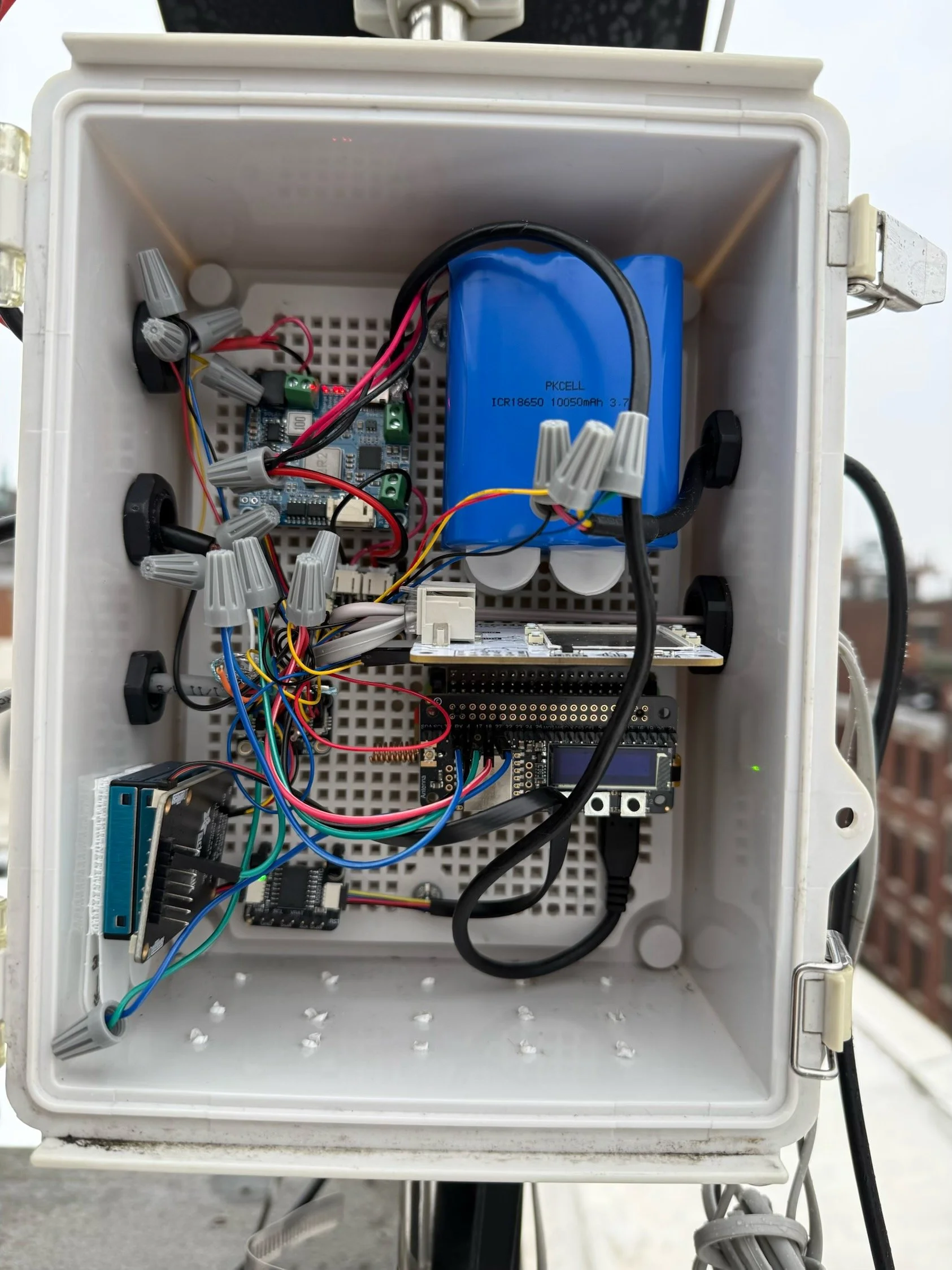  Here is the junction box where all the station electronics are stored. The wiring in here is very messy as you can see, especially with the addition of the MB7374.  There are five gaskets of varying PG-sizes that contain the wires going in and out o