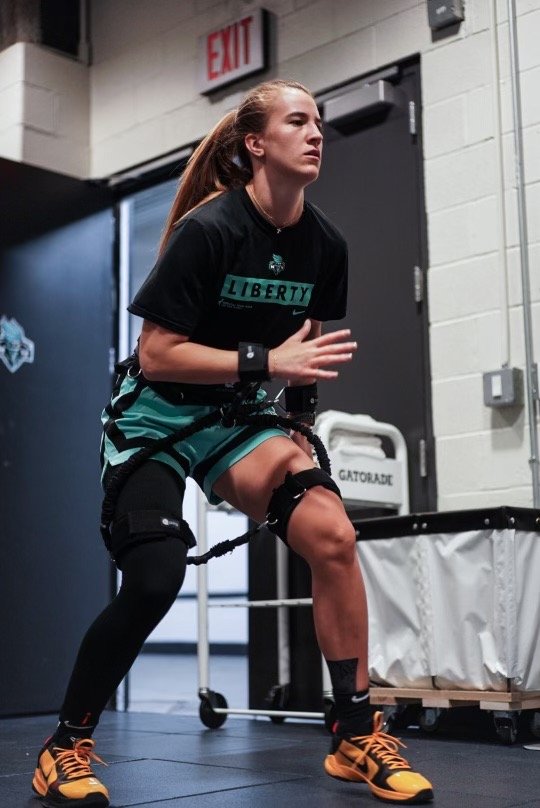Sabrina Ionescu training with Q-Bands