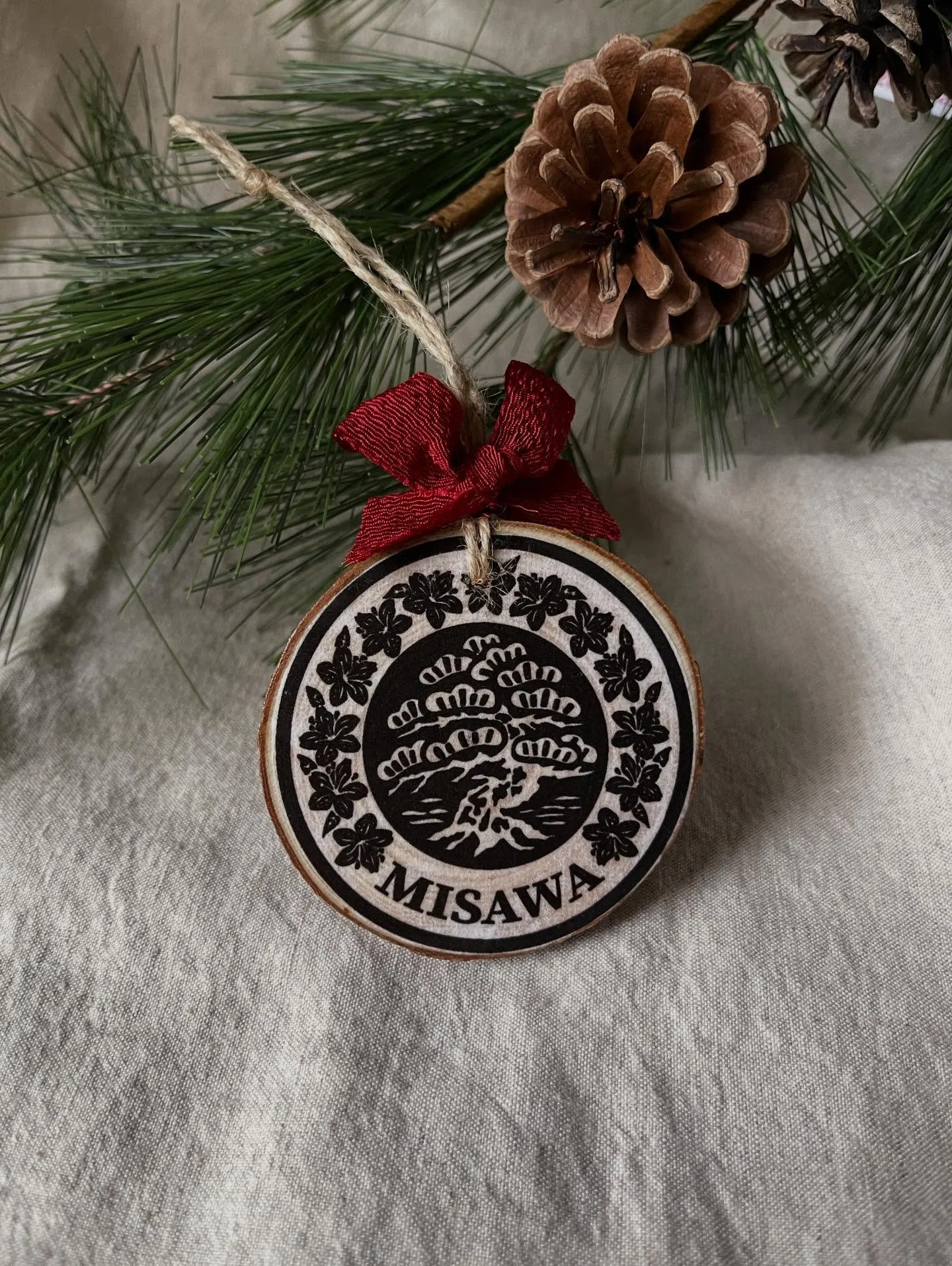 If you live in Misawa this ornament is a beautiful keepsake. All profits from sales will be donated to the Edgren high school art students that are traveling to Far East Creative Expressions. https://carrieannhall.com/shop/misawa-manhole-ornament