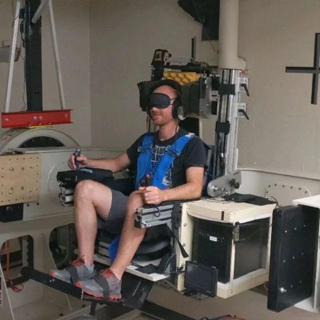 While I was at the Ashton Grabiel Spatial Orientation Lab, I also got to try the Two Axis chair, which can rotate around two axes.  You put on a blindfold and ear covers then the chair moves through some rotation. .
Your vestibular system has two set