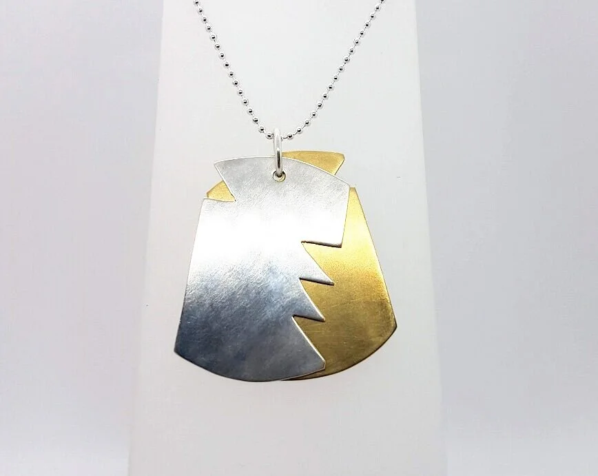 Unisex dog tag pendants with shark bite design