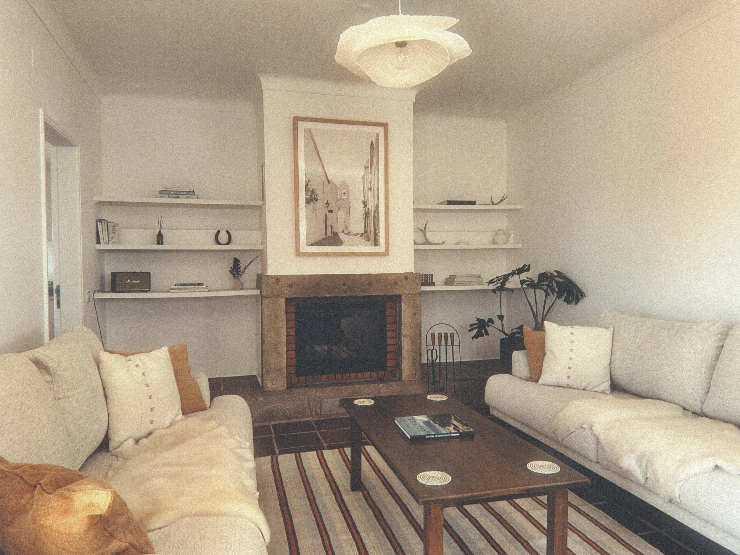 Cozy Living Room with Fireplace in Casa Palo Verde at The Blanco Bungalow Ericeira Portugal.JPG
