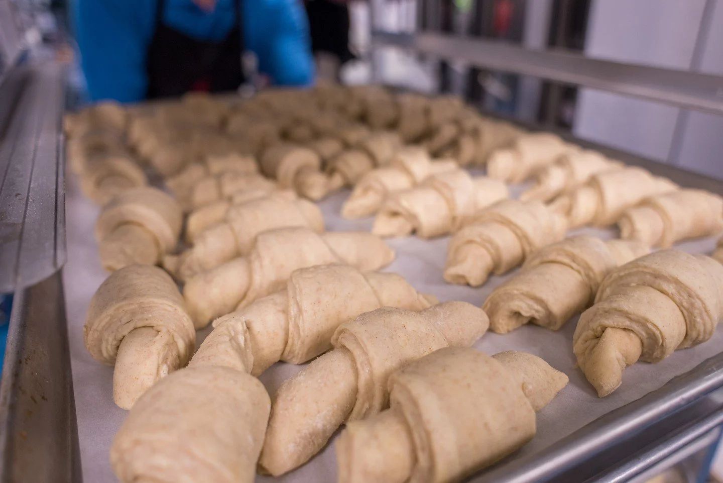 Croissants waiting to proof. Laminated dough is technical work&mdash;butter, folds, and a lot of patience. Have you ever tried making them?

#Croissants #BakersLife #ArtisanBaking