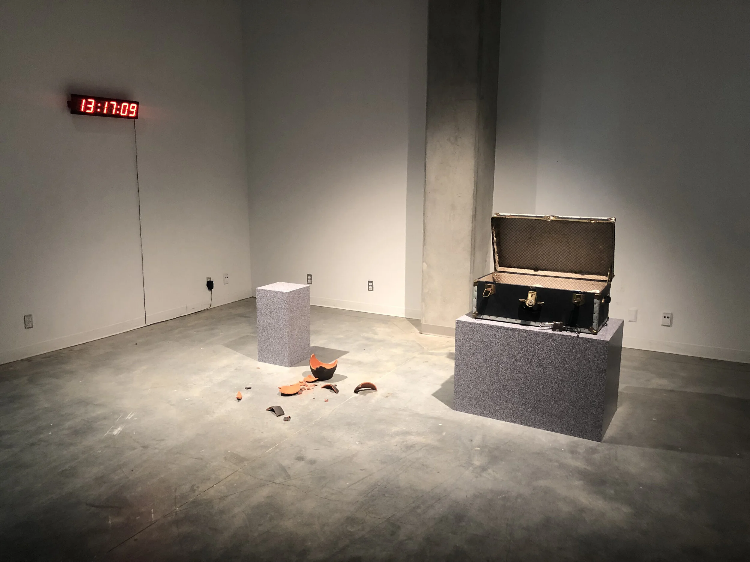 Michael Edward Miller Level One: Agency , 2019, reduction fired storage jar with granite feldspar, vintage padlock + key, patterned vinyl, MDF plinths, vintage chest, digital timer, players