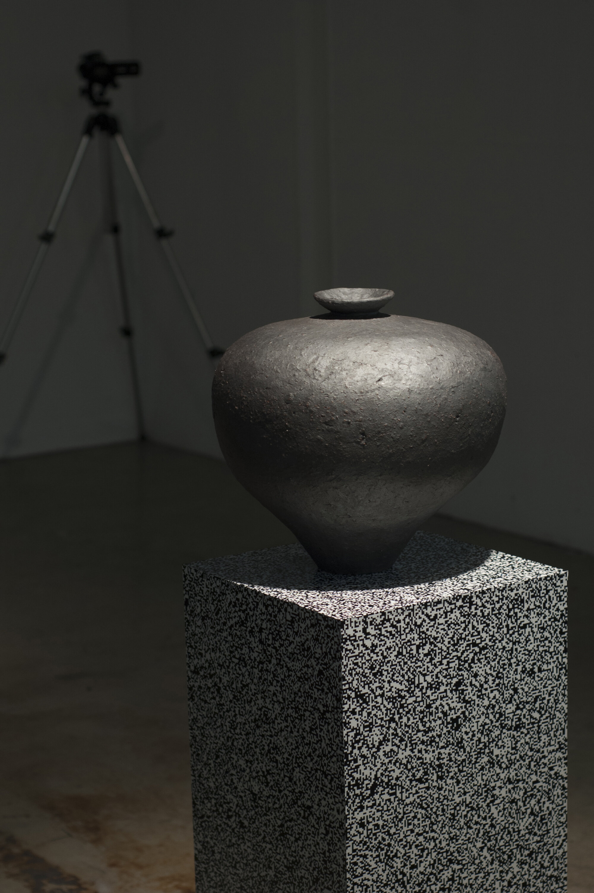 Michael Edward Miller Level One: Agency (prototype) , 2017, hand-coiled reduction fired storage jars with granite feldspar, large smokey quartz crystals, patterned vinyl, MDF plinths, digital timer, sound, light, players