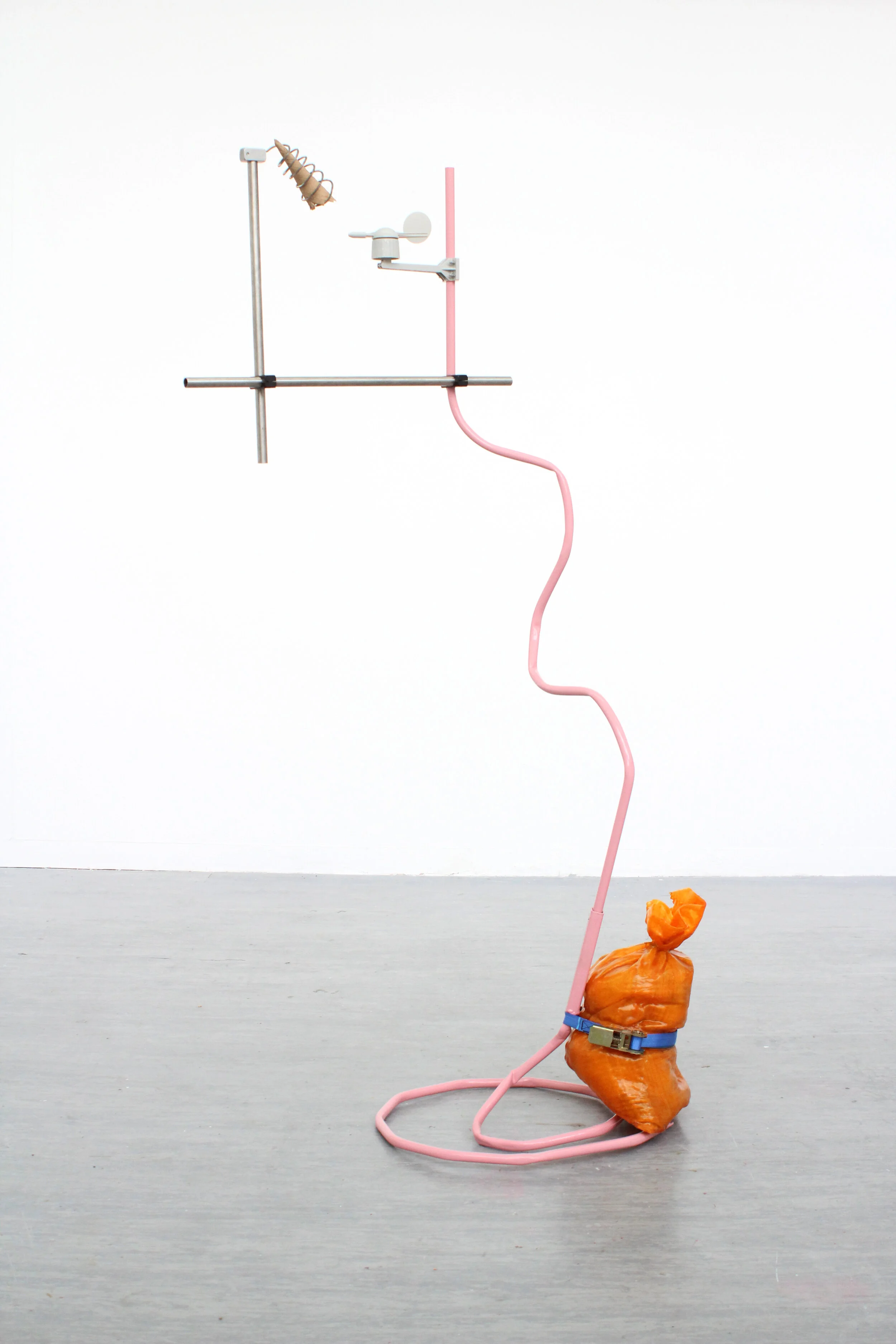  WHIPPY, 2021.   Wind direction meter, ceramic waffle cone, resin laminated sandbag, ratchet strap, powder coated steel.   200 x 100 x 70cm. 