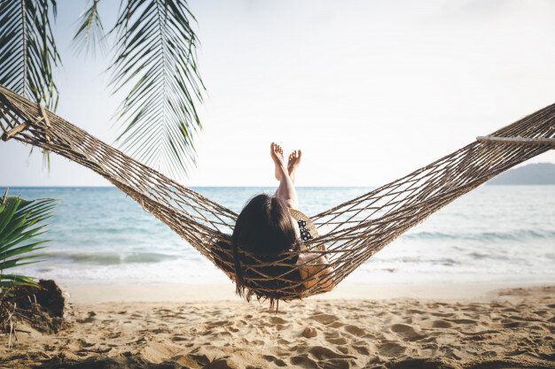 happy-woman-relaxing-hammock_64030-12.jpg