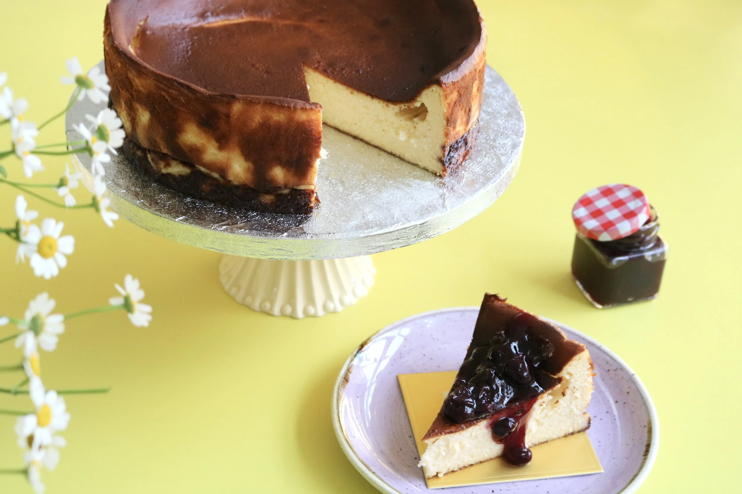 burnt basque cheesecake in London with homemade blueberry compote filling