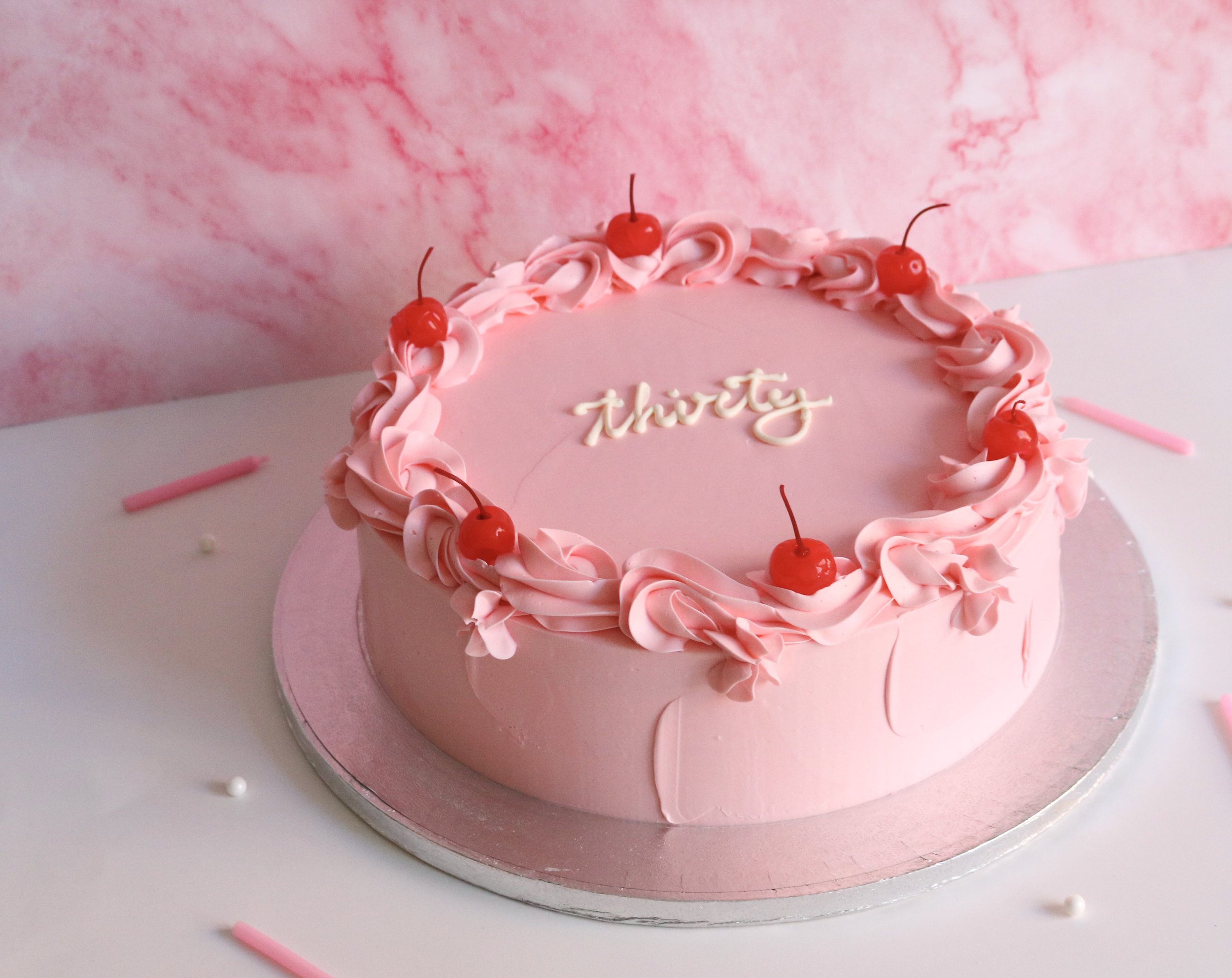 baby pink vintage birthday cake in London