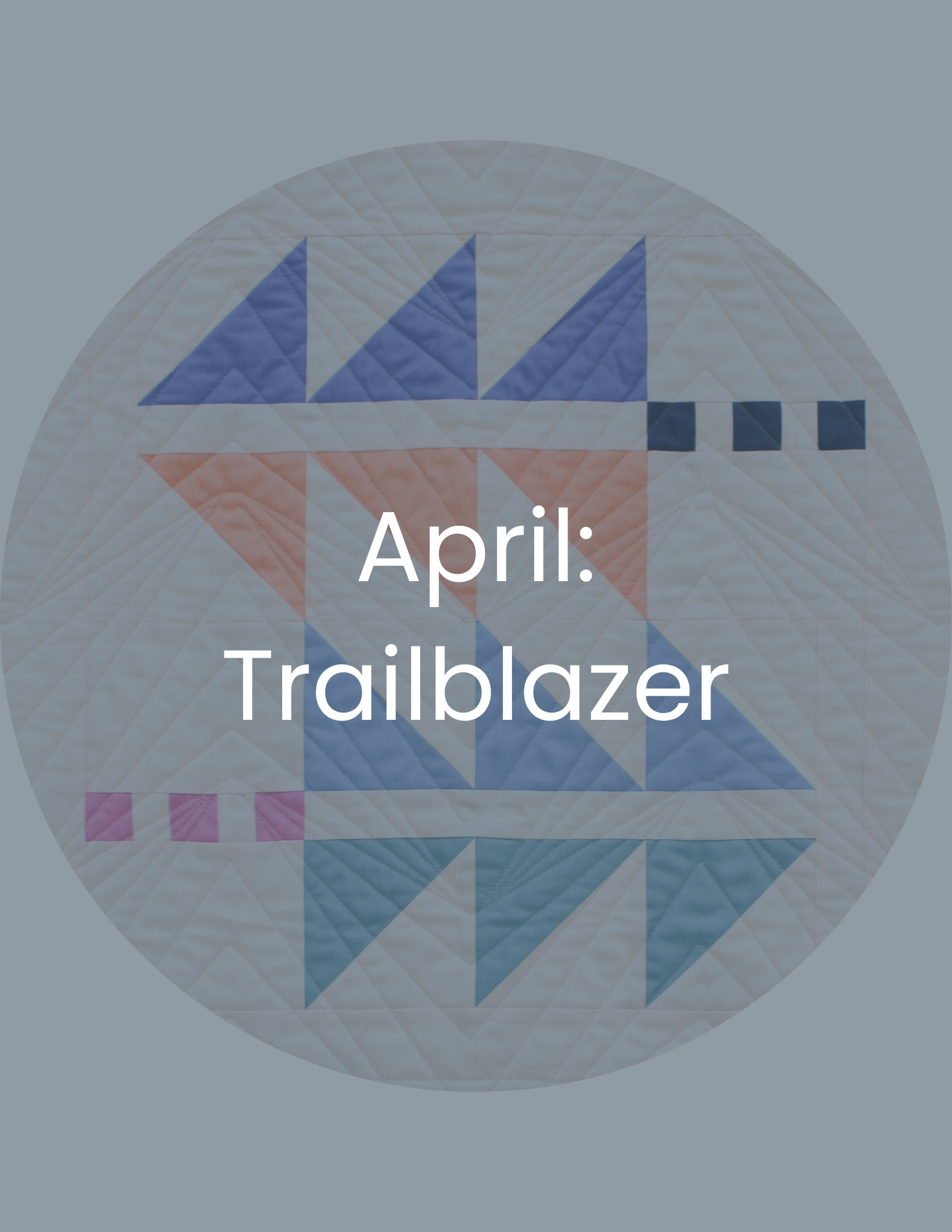 A quilted circular quilt with a nautical-themed design and the text 'April: Trailblazer' overlaid in white.