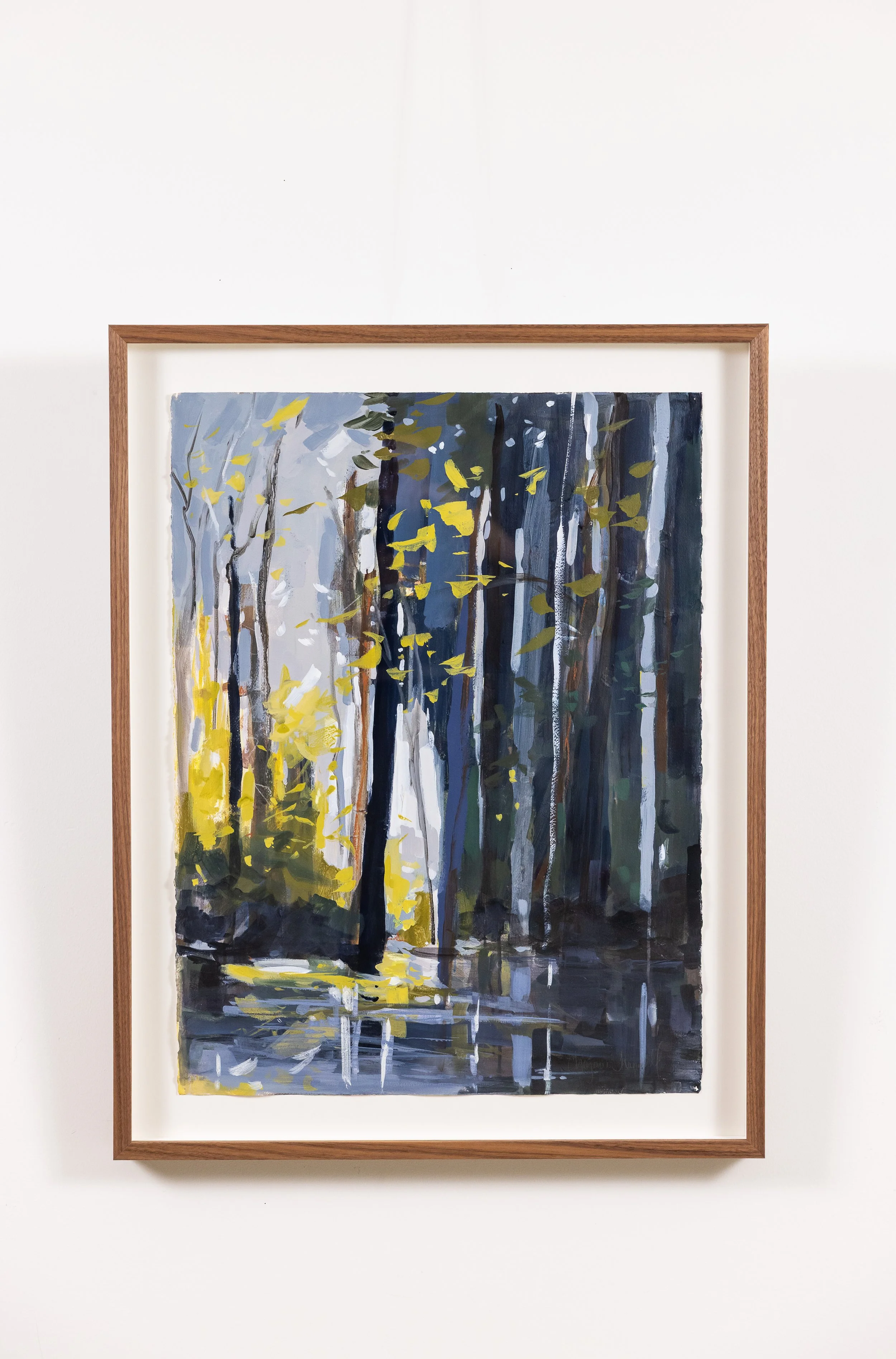 Framed landscape painting by Asheville artist Cheyenne Trunnell showing light filtering through a forest.