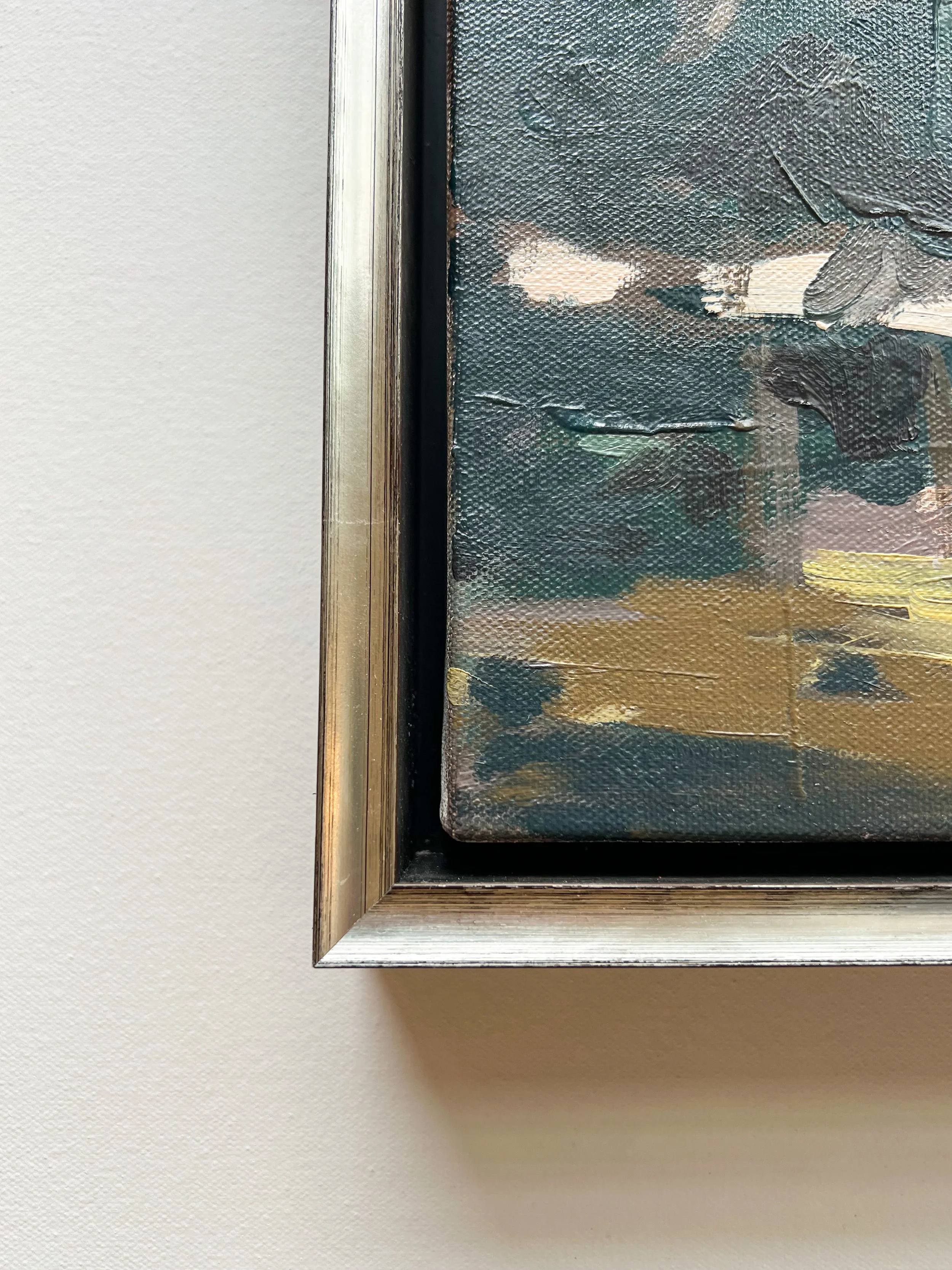 Original oil landscape painting by Asheville artist Cheyenne Trunnell depicting the silver frame of the painting