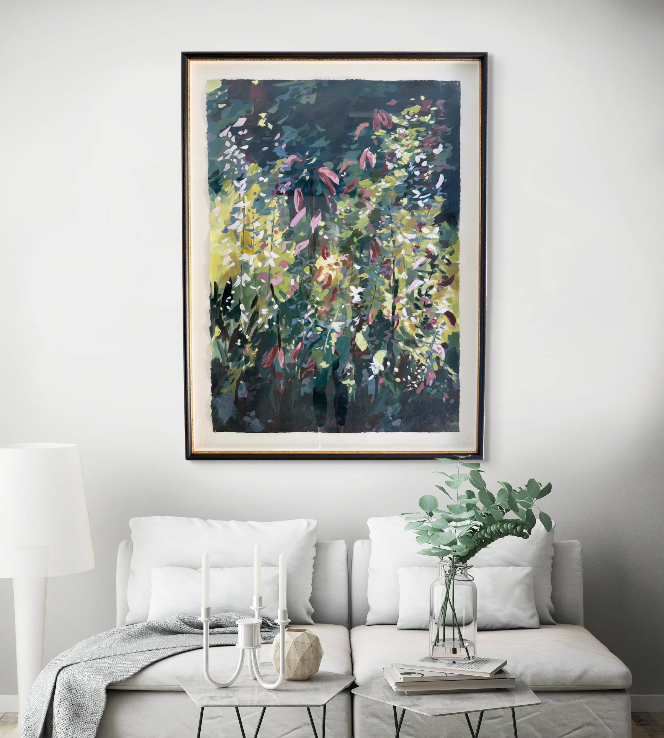 Framed abstract floral landscape painting by Asheville artist Cheyenne Trunnell displayed in a living room setting.