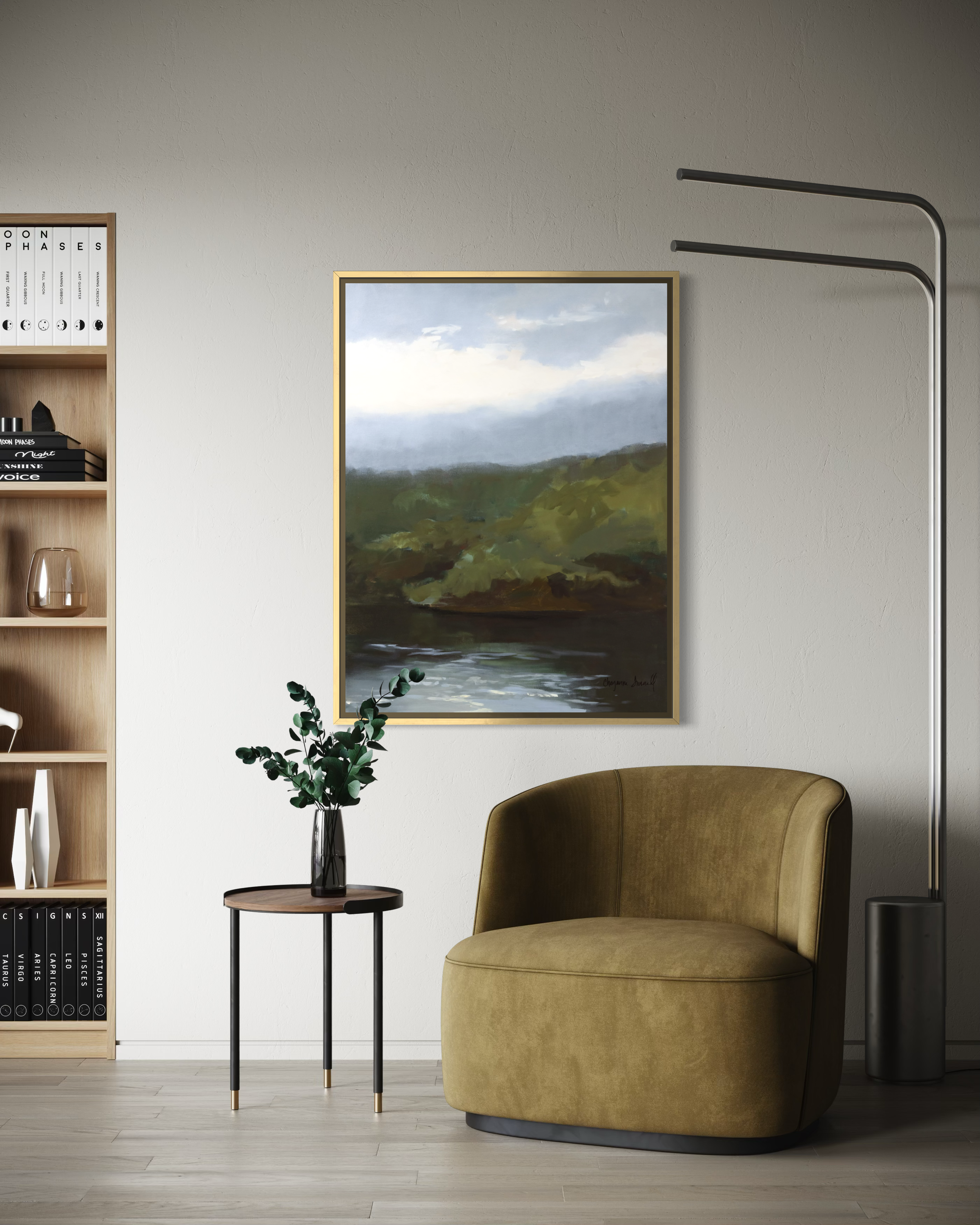 On the Wings of Dawn II by Cheyenne Trunnell, shown framed in a modern interior above an olive accent chair with warm wood and black details.