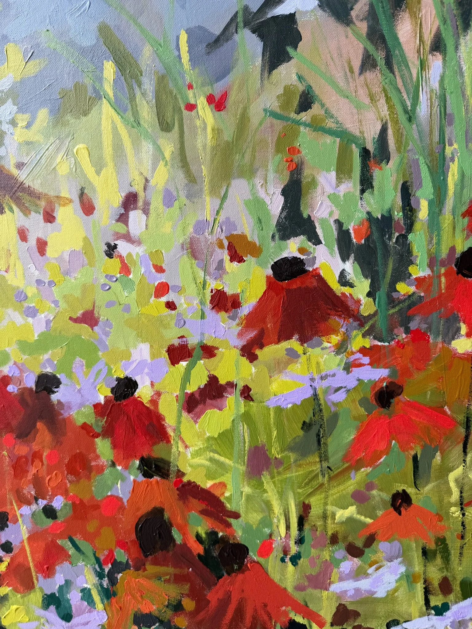 Close-up of red-orange wildflowers, lavender accents, and layered green brushwork in an original mixed media painting by Cheyenne Trunnell.