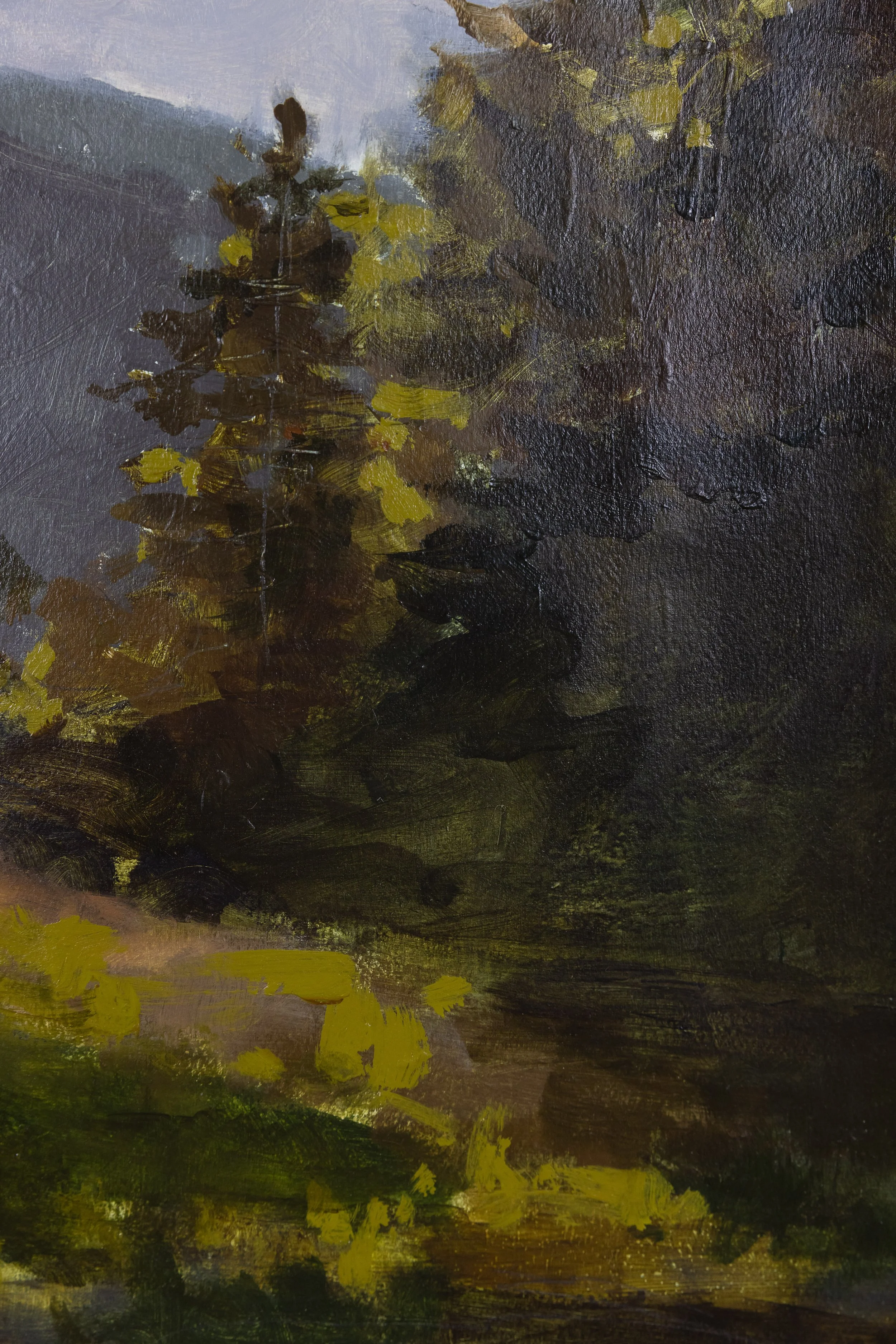 Detail of Cheyenne Trunnell’s landscape painting, featuring layered evergreen trees, deep forest shadows, and bright yellow-green brushwork along the clearing.