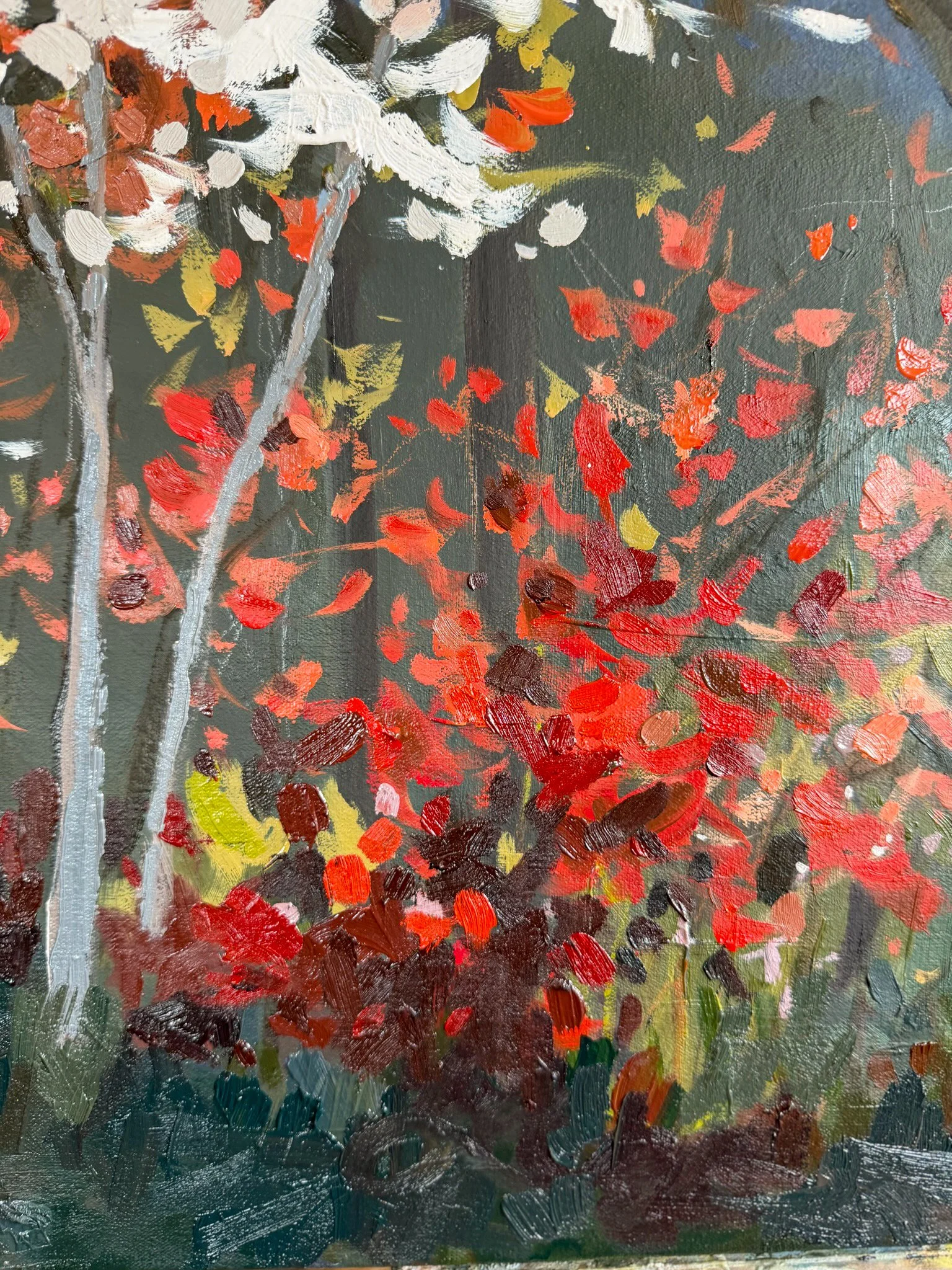 Close-up of vibrant red and orange wildflowers painted in thick oil brushstrokes, creating movement and texture in a spring mountain landscape painting.