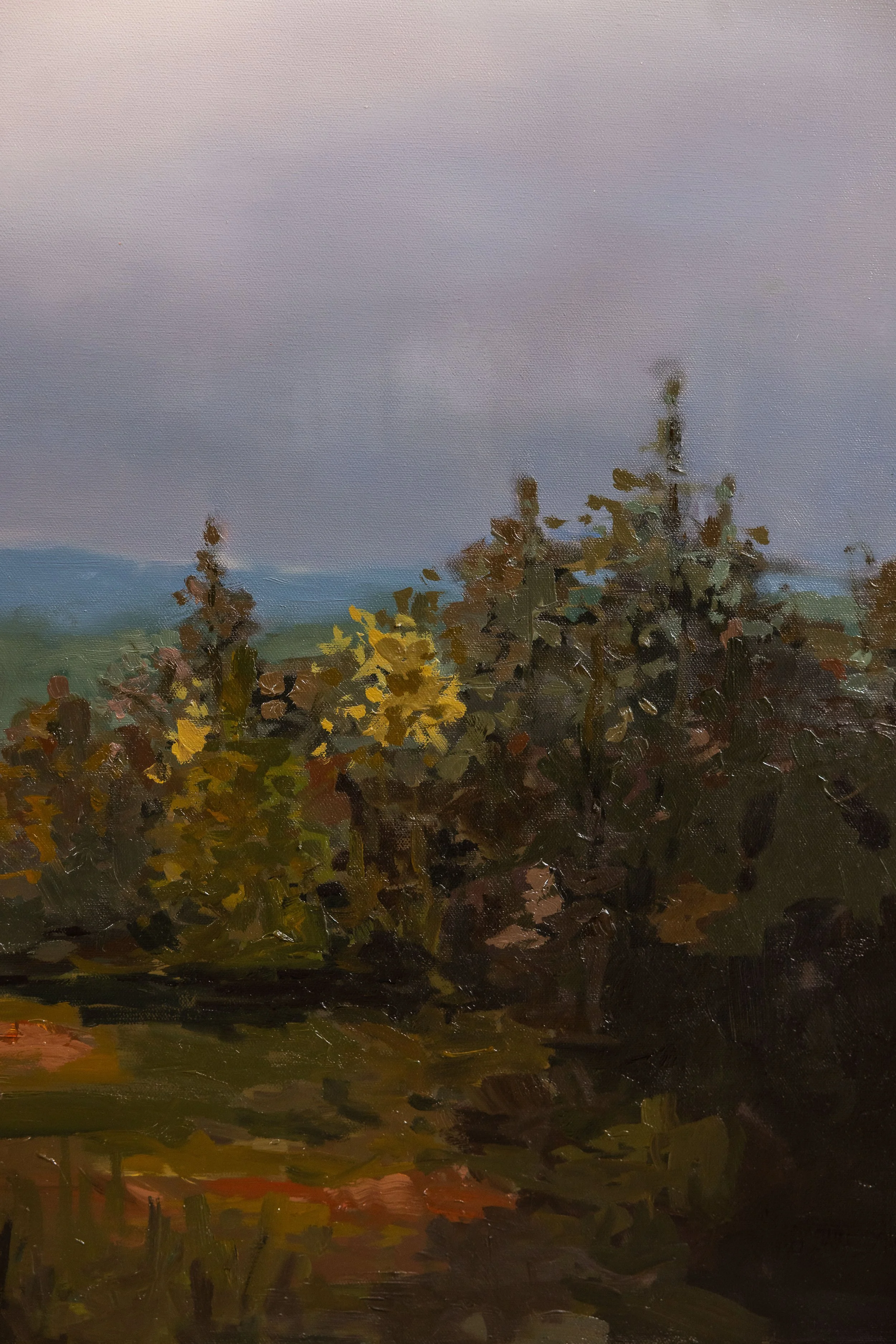 Detail of original oil landscape painting by Asheville artist Cheyenne Trunnell highlighting layered fall trees and expressive brushwork in the foreground, framed, 37x45 inches.