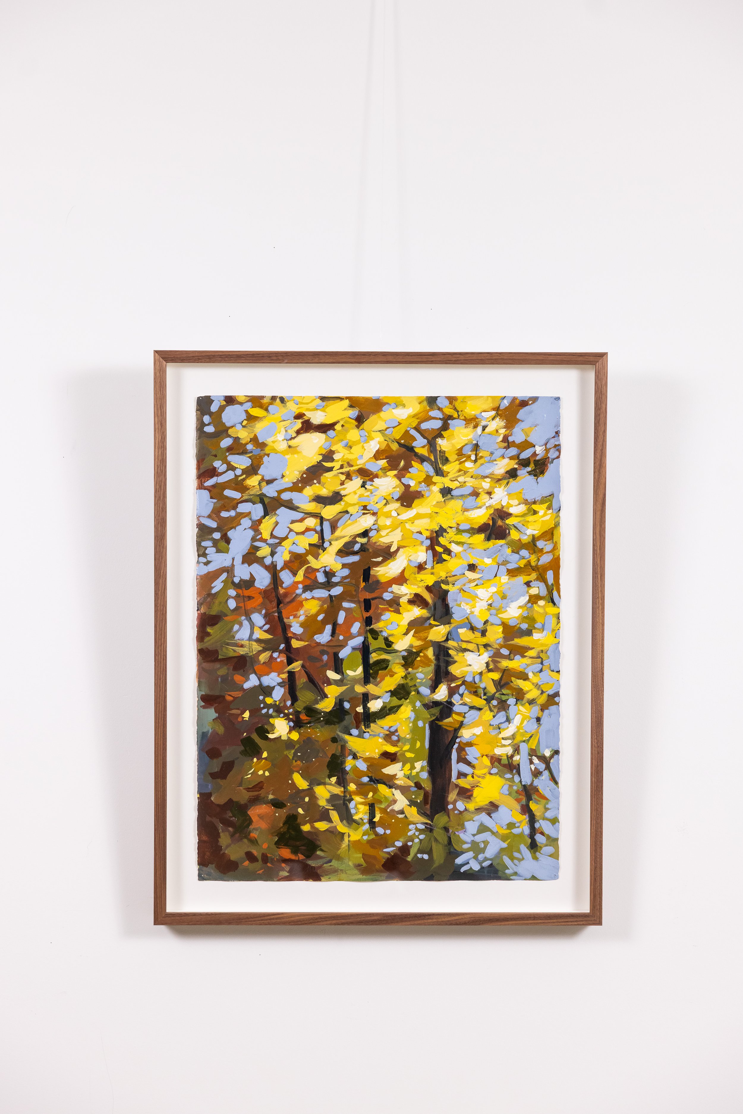 Framed landscape painting by Asheville artist Cheyenne Trunnell featuring autumn leaves and forest light.