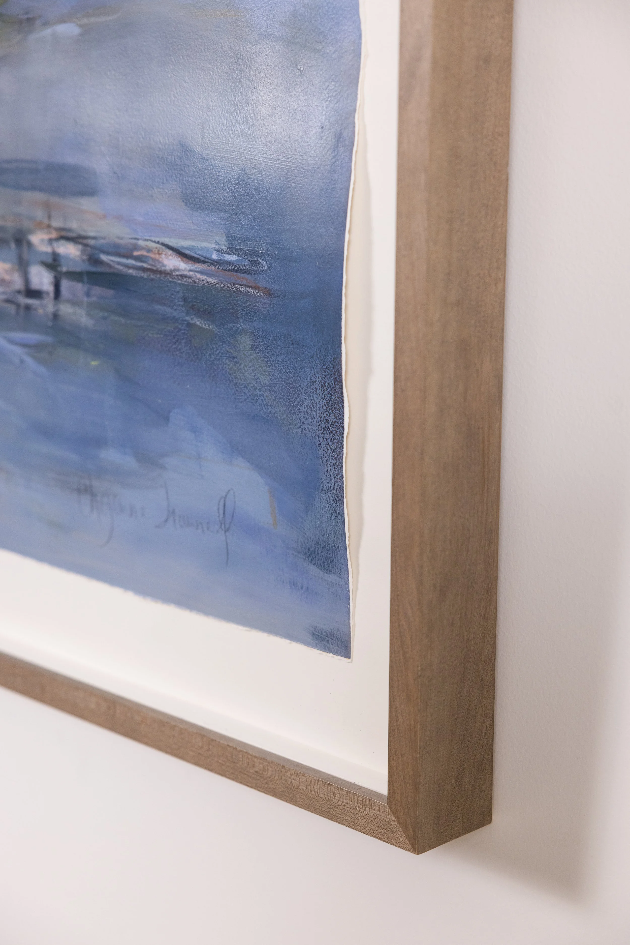 Detail of framed abstract landscape painting by Asheville artist Cheyenne Trunnell showing brushwork and wood frame.