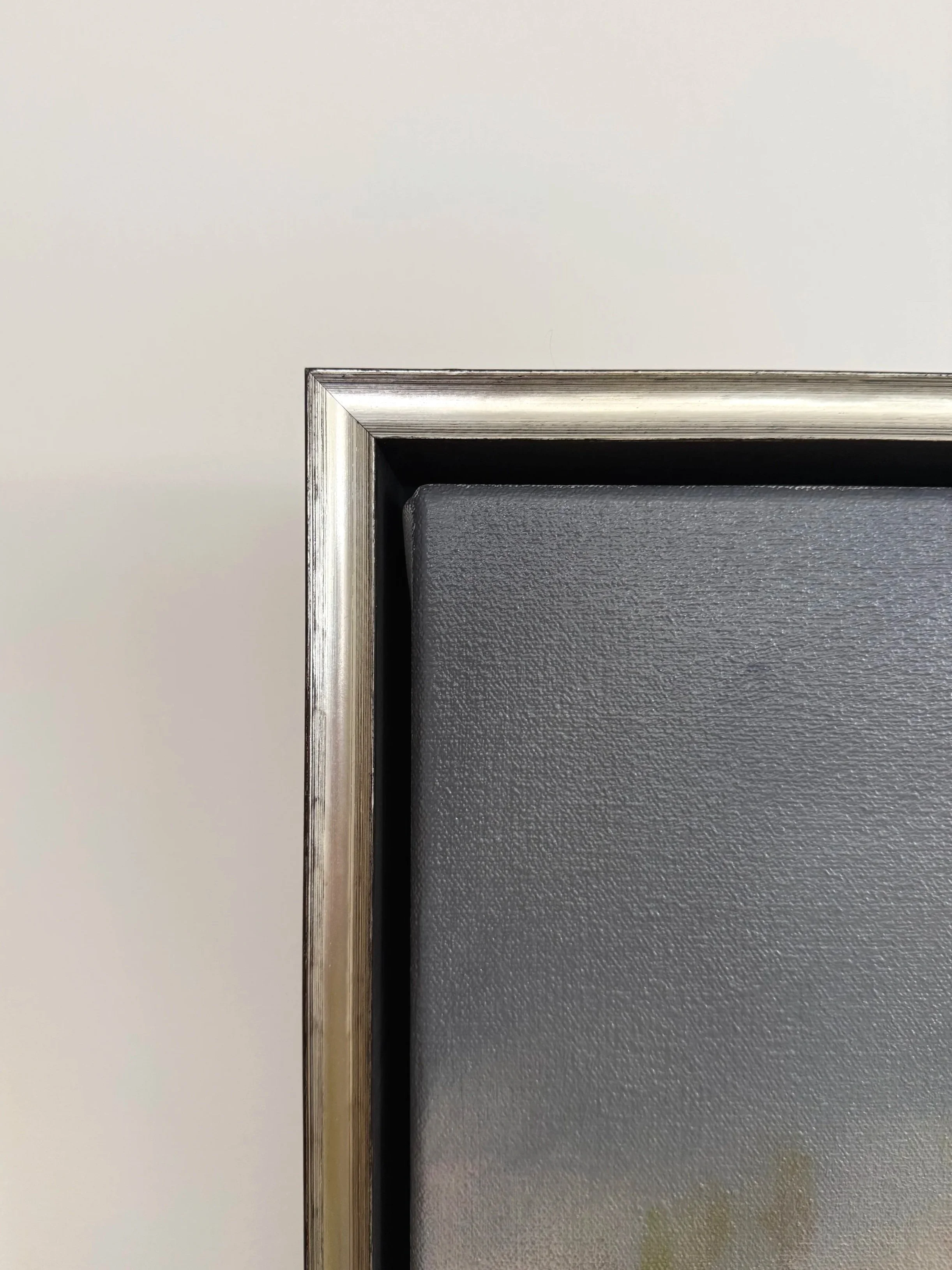 Original oil landscape painting by Asheville artist Cheyenne Trunnell showing warm light spreading across soft hills and sky, symbolizing presence and quiet reflection, frame detail, 24x24 inches.