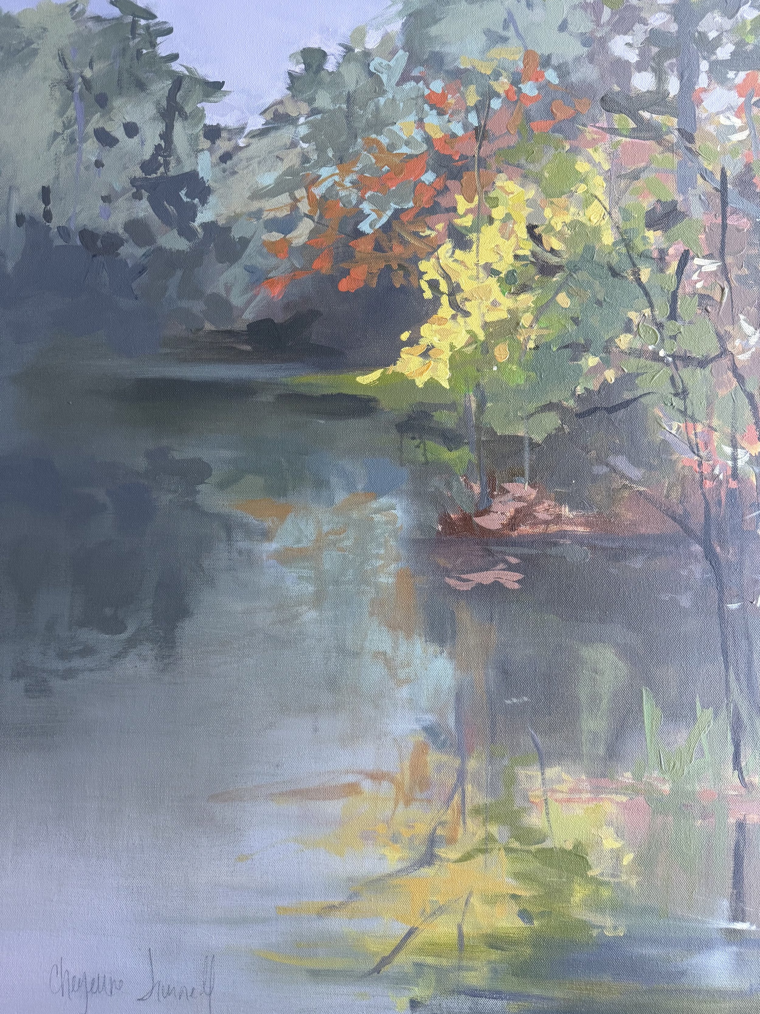 Detail of Our Hearts Are Restless Until They Rest in Thee by Cheyenne Trunnell, showing reflected water, colorful foliage, and the artist’s signature at the lower edge.