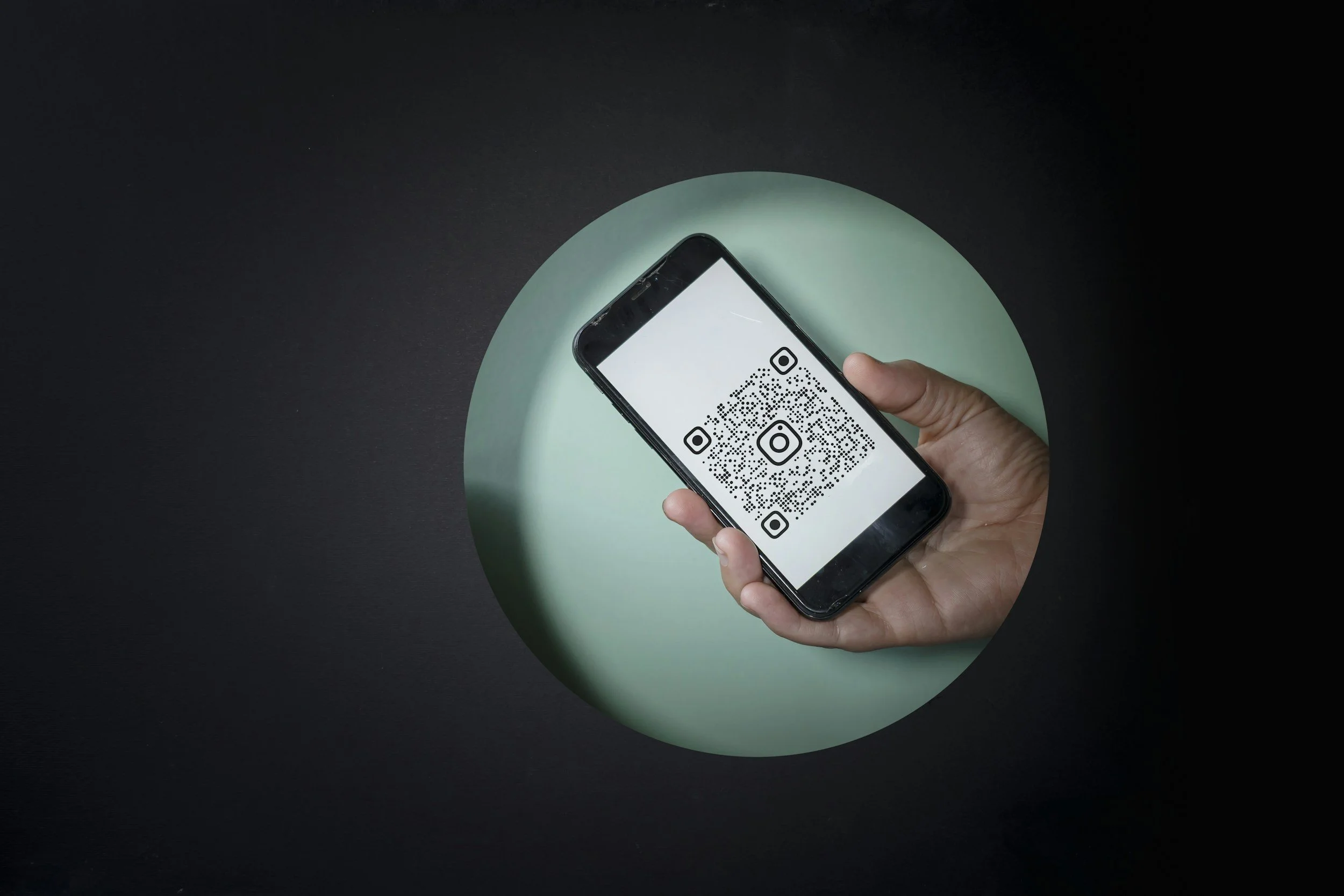 Smartphone displaying a QR code