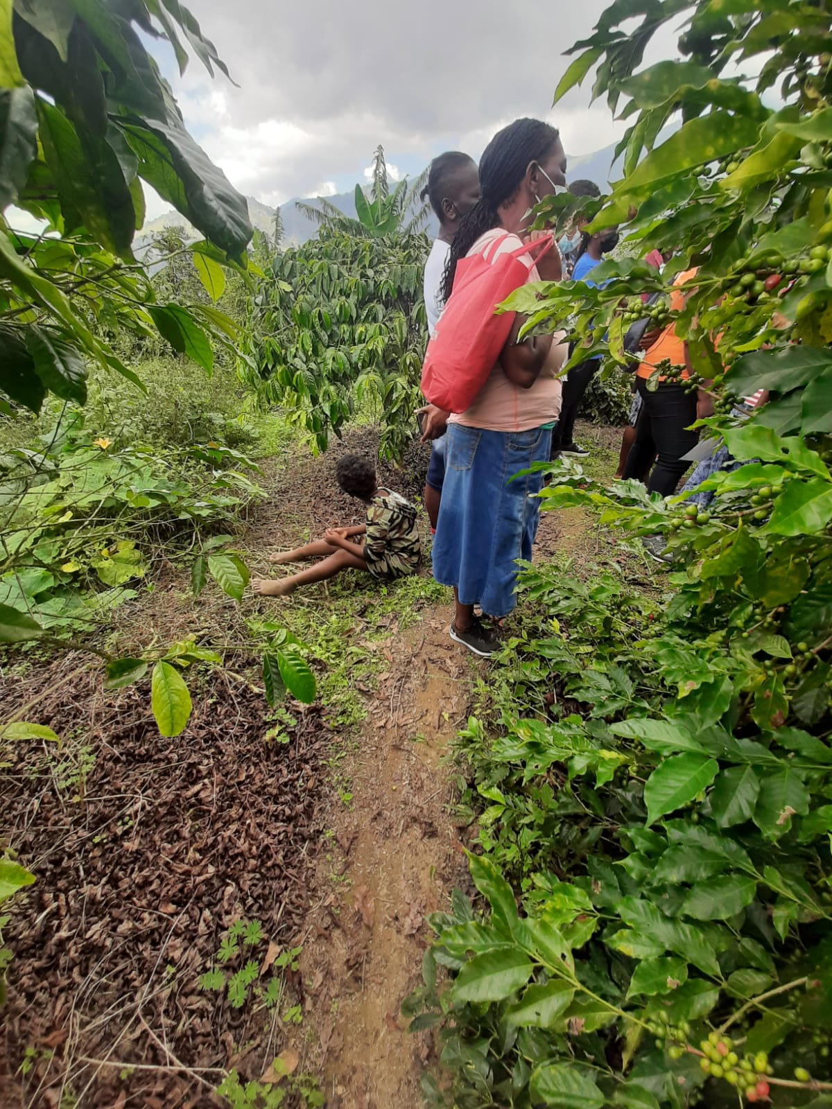 Figure 2: A mother with her young baby in the field