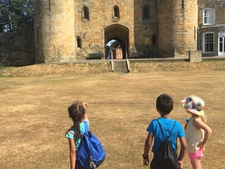 Children outside a castle