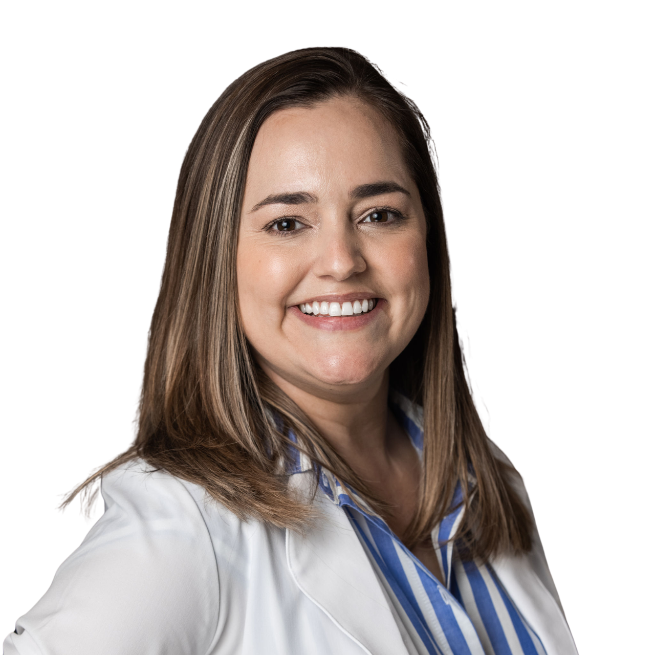 Portrait of a woman with long brown hair wearing a white blazer and a blue and white striped shirt, smiling in an indoor setting.