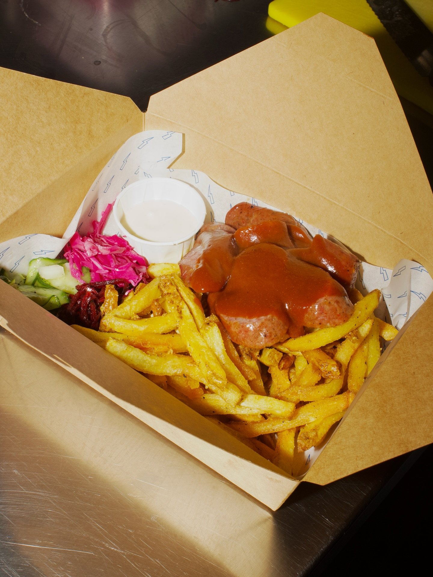 Sunday Snag is evolving&hellip;

Currywurst, electric fries, pickles, mayo &pound;12

&pound;5 glass of nice rośe to go with it. Cuv&eacute;e des Chartreux Vin de Pays du Gard Ros&eacute;

Inspired by multiple visits to @pommesundwein we think about 